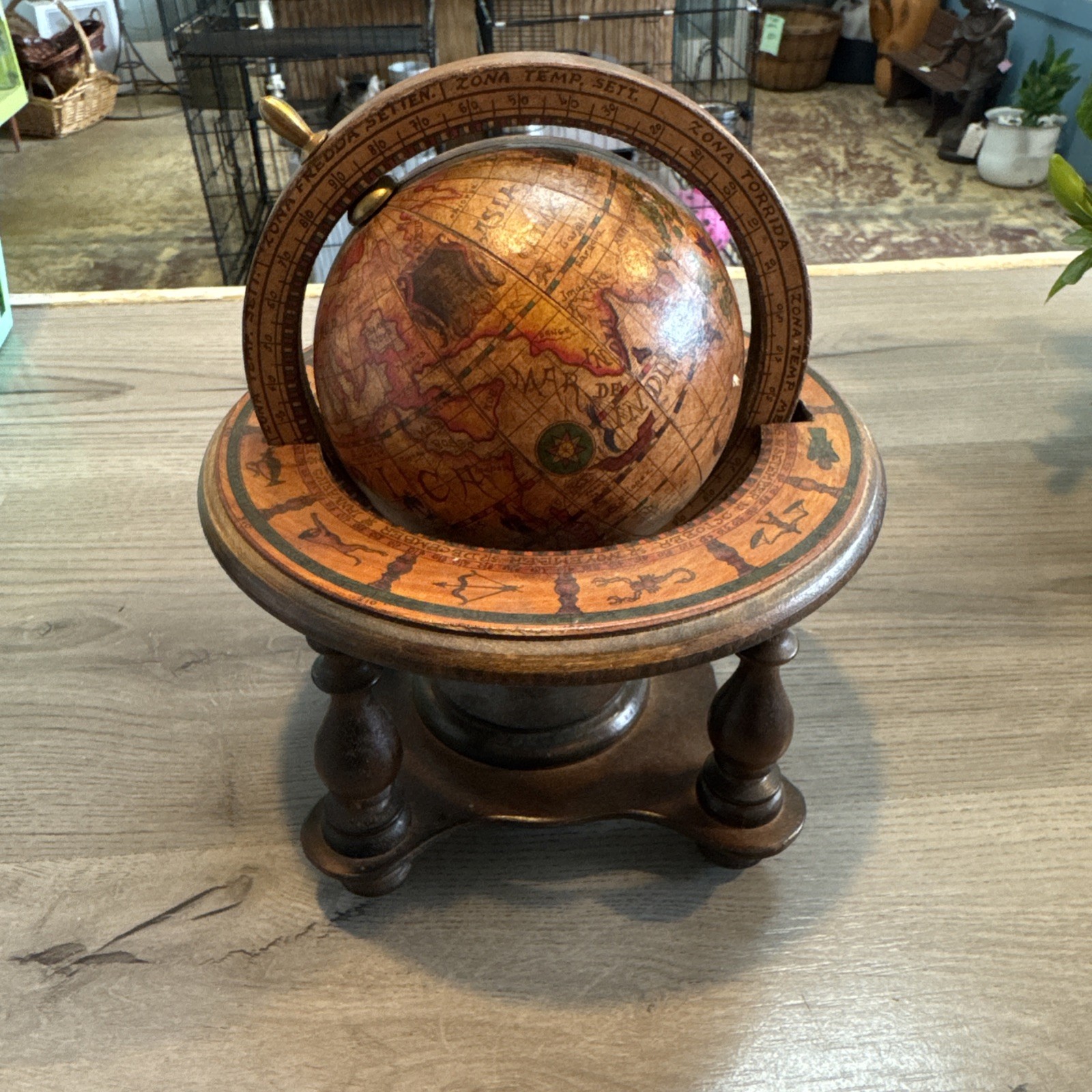 Old world wooden desktop globe on rotating stand with pedestals made in Italy