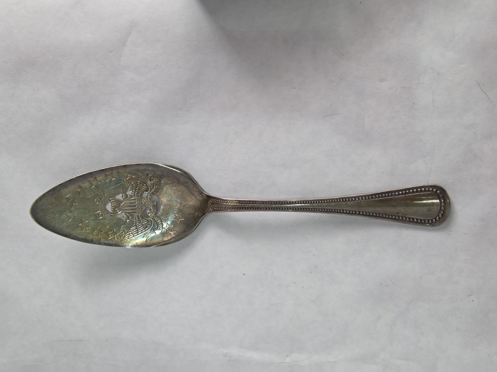 1776–1976 Bicentennial Eagle Silverplate Slotted Serving Spoon