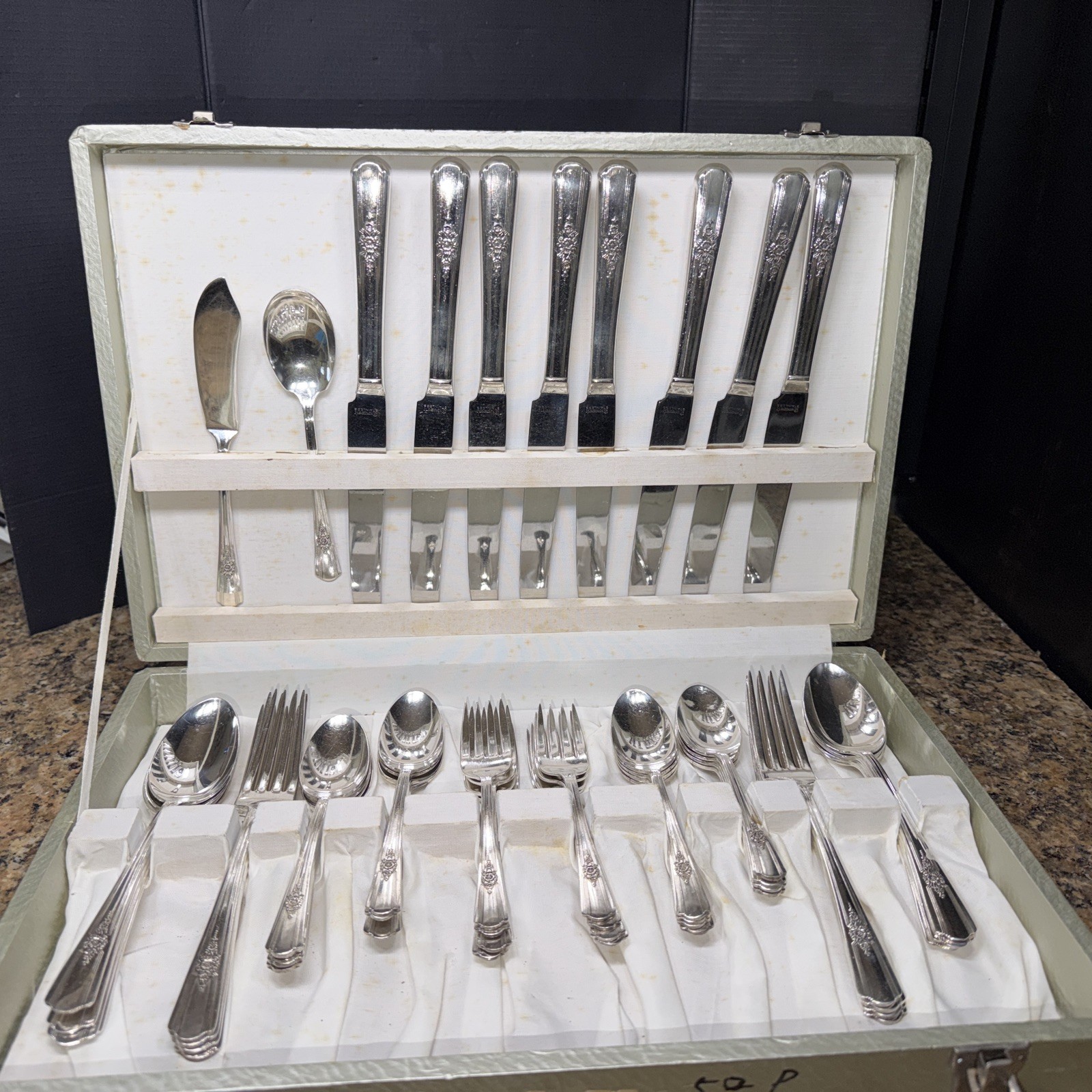 50 piece, Brittany Rose pattern by Wm. A. Rogers / Oneida