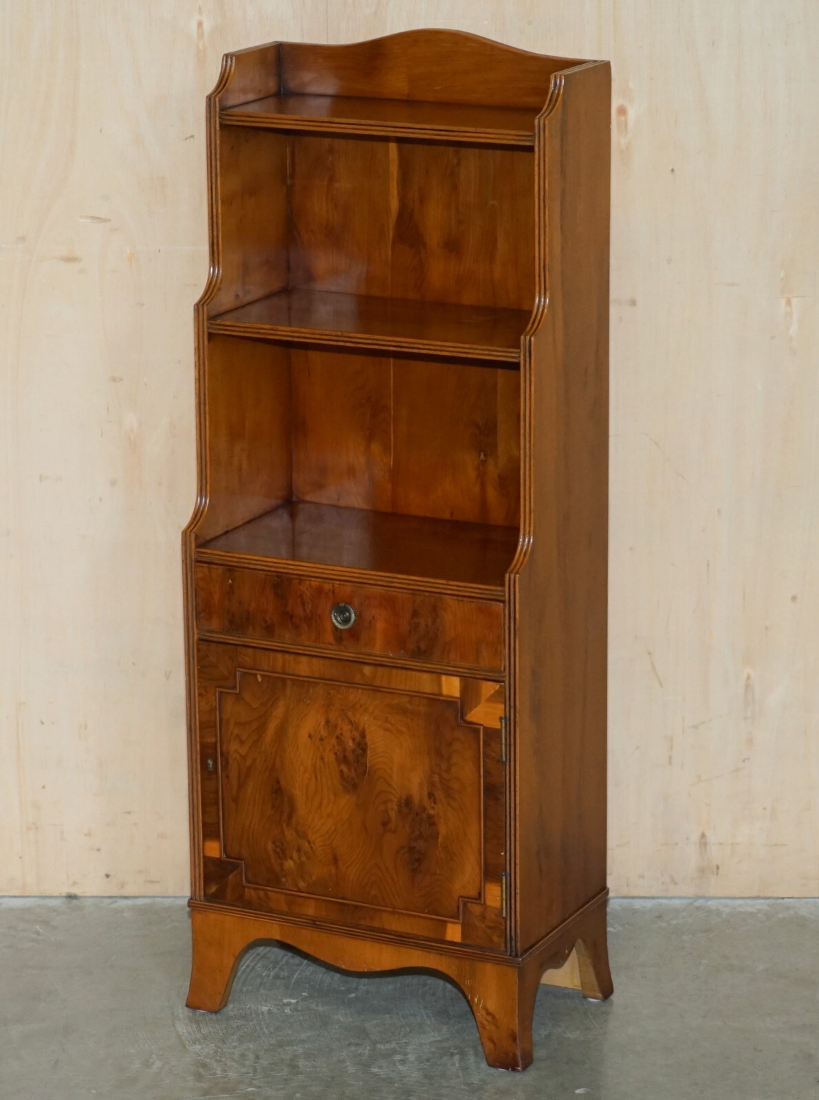 PAIR OF VINTAGE ENGLISH FLAMED MAHOGANY WATERFALL BOOKCASES WITH CUPBOARD BASES