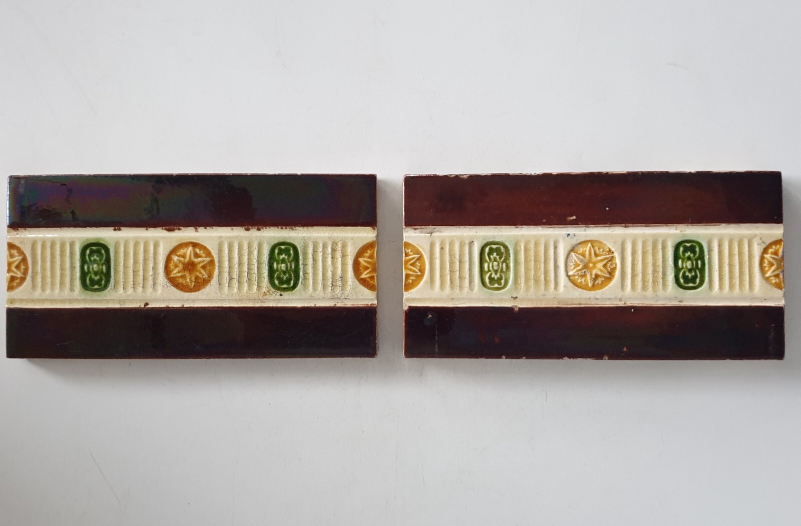 Pair of Art Nouveau 6″ x 3″ Spacer Floral Majolica Tiles by Henry Richards C1900