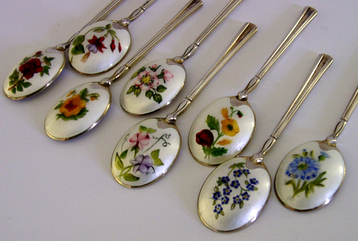 EIGHT STUNNING SOLID STERLING SILVER ENAMELLED FLOWER SPOONS 1972
