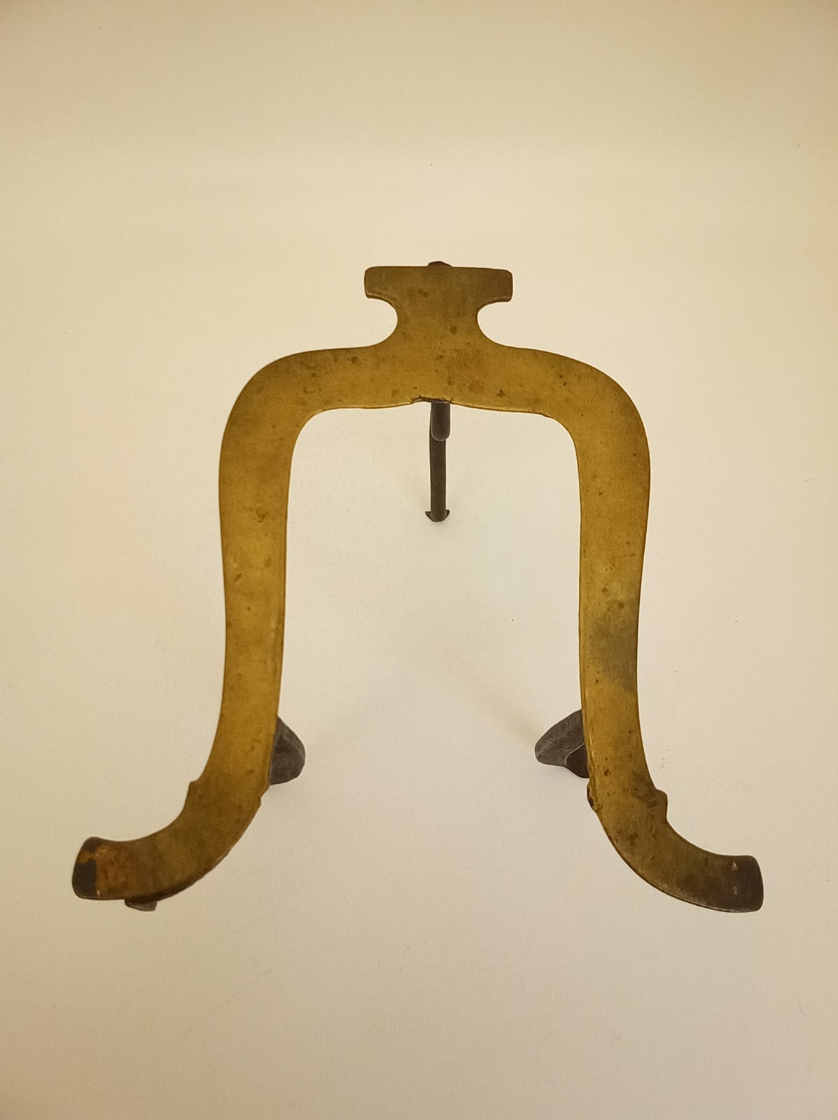 Antique primitive wrought iron standing trivet brass top Pennyslvania Dutch
