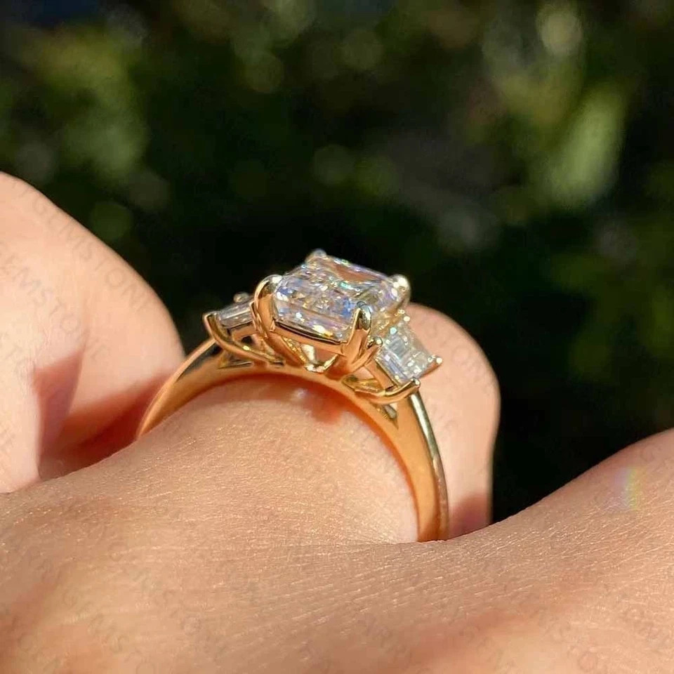 3Ct Emerald Cut Lab Created Diamond Three Stone Ring 14K Yellow Gold Plated
