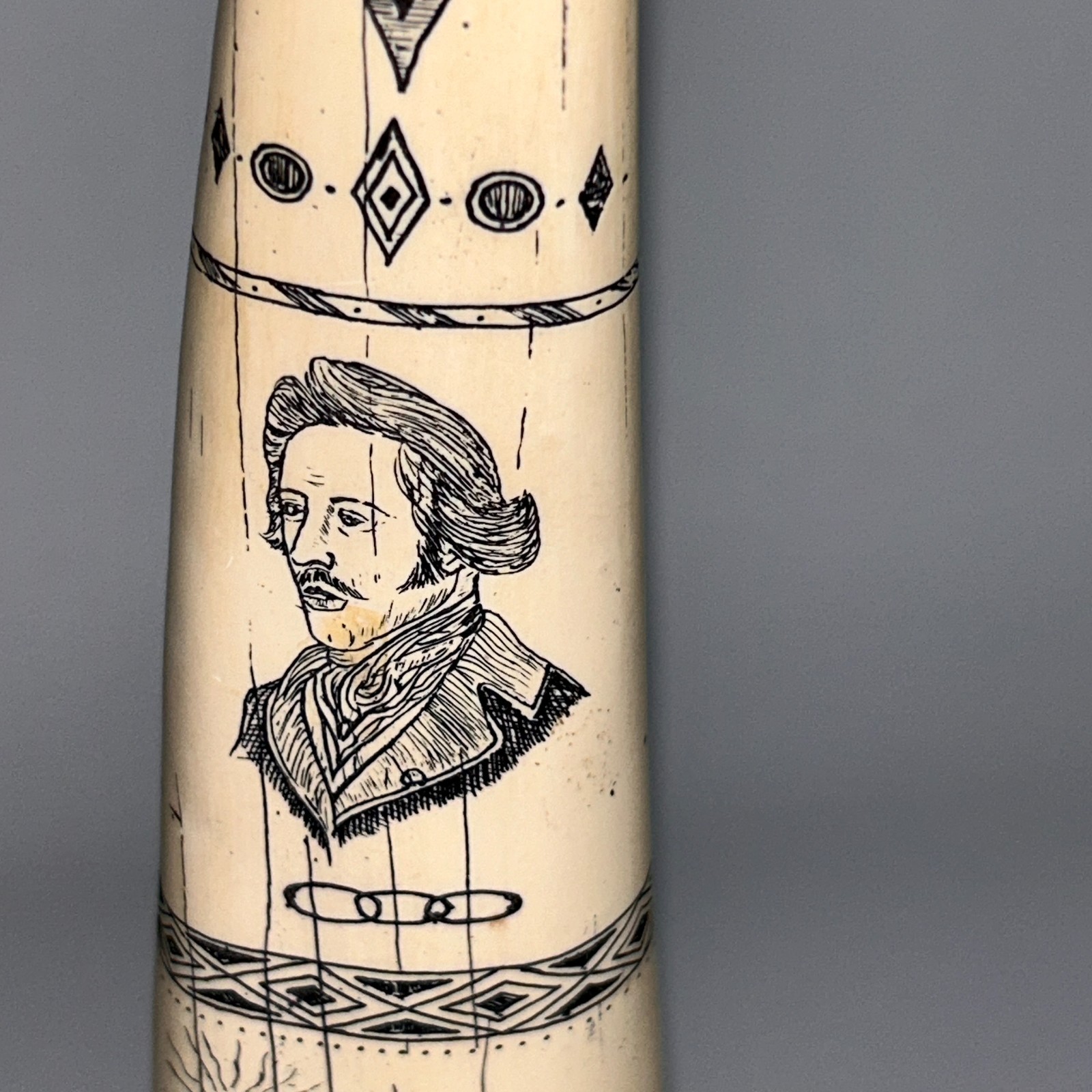 Scrimshaw Replica Walrus Tusk “Regulus” Captain James Head Ivory-color Resin 14″