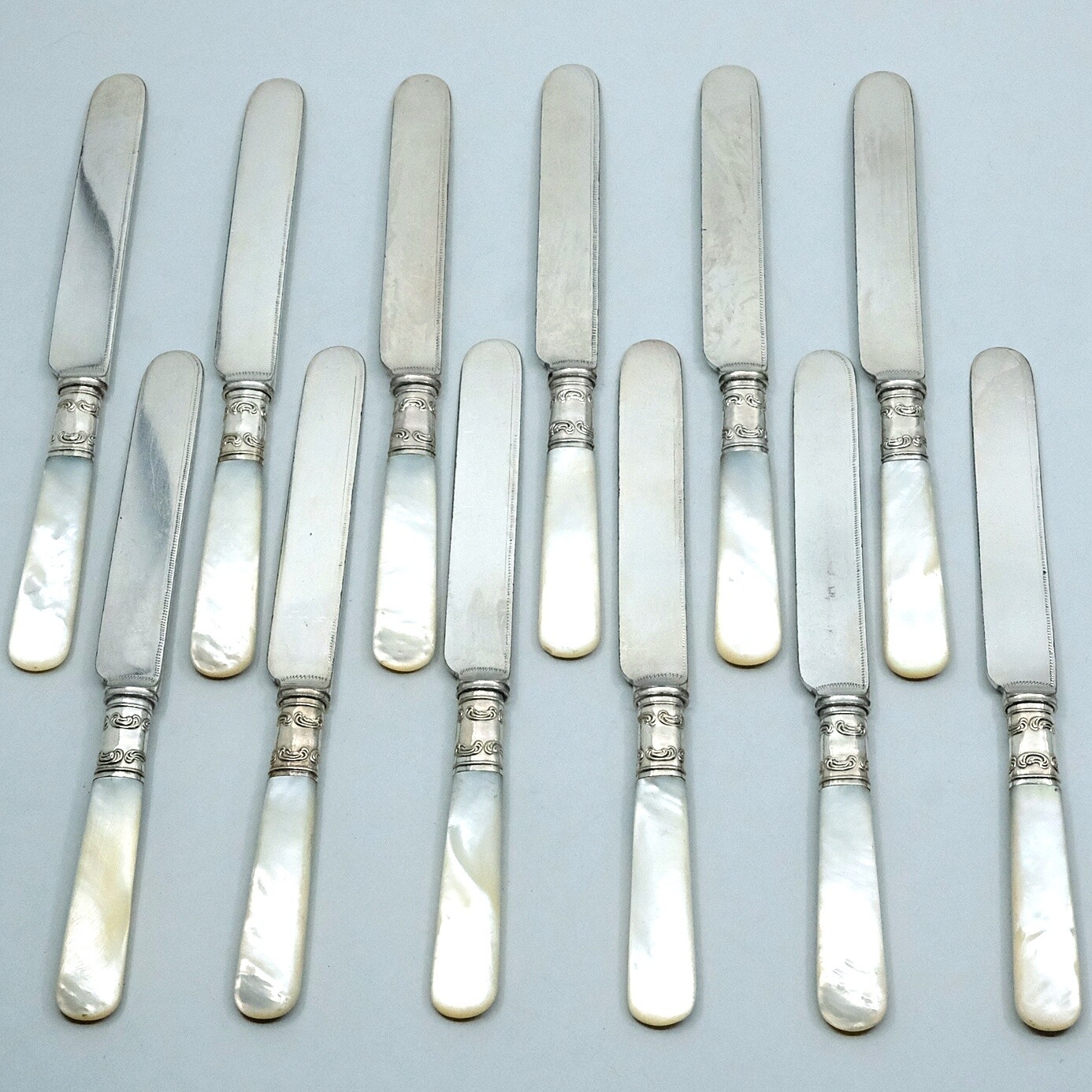 Set of 12 Silver Collared Mother of Pearl Handled Breakfast Knives ~8″