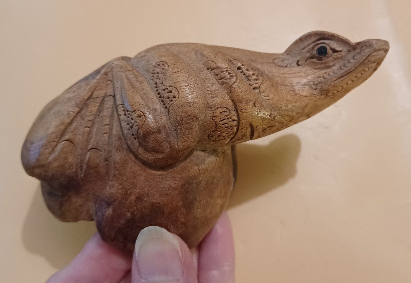 Carved wooden model of a frog from burl wood or drift wood