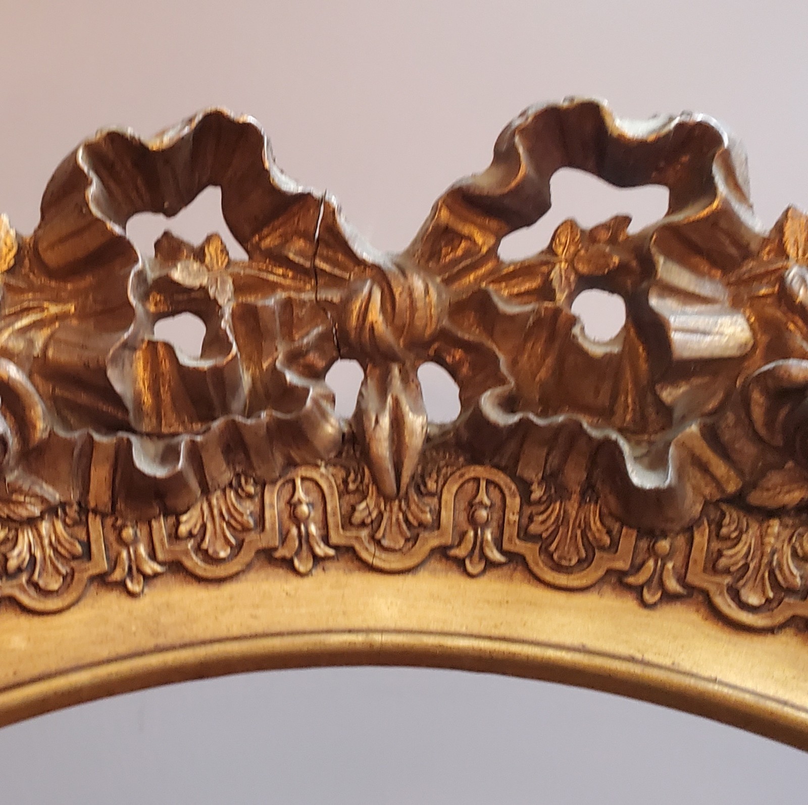 * French Louis XVI-style oval gilt frame floral garlands & ribbon antique