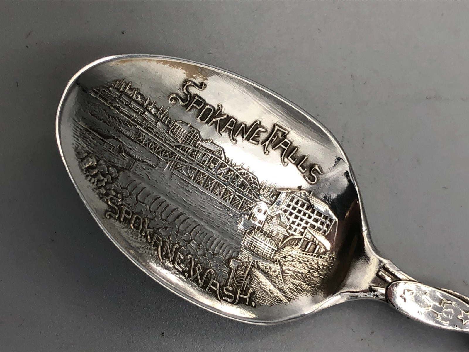 Spokane, Washington sterling silver souvenir spoon, 5 3/8″, American Indian