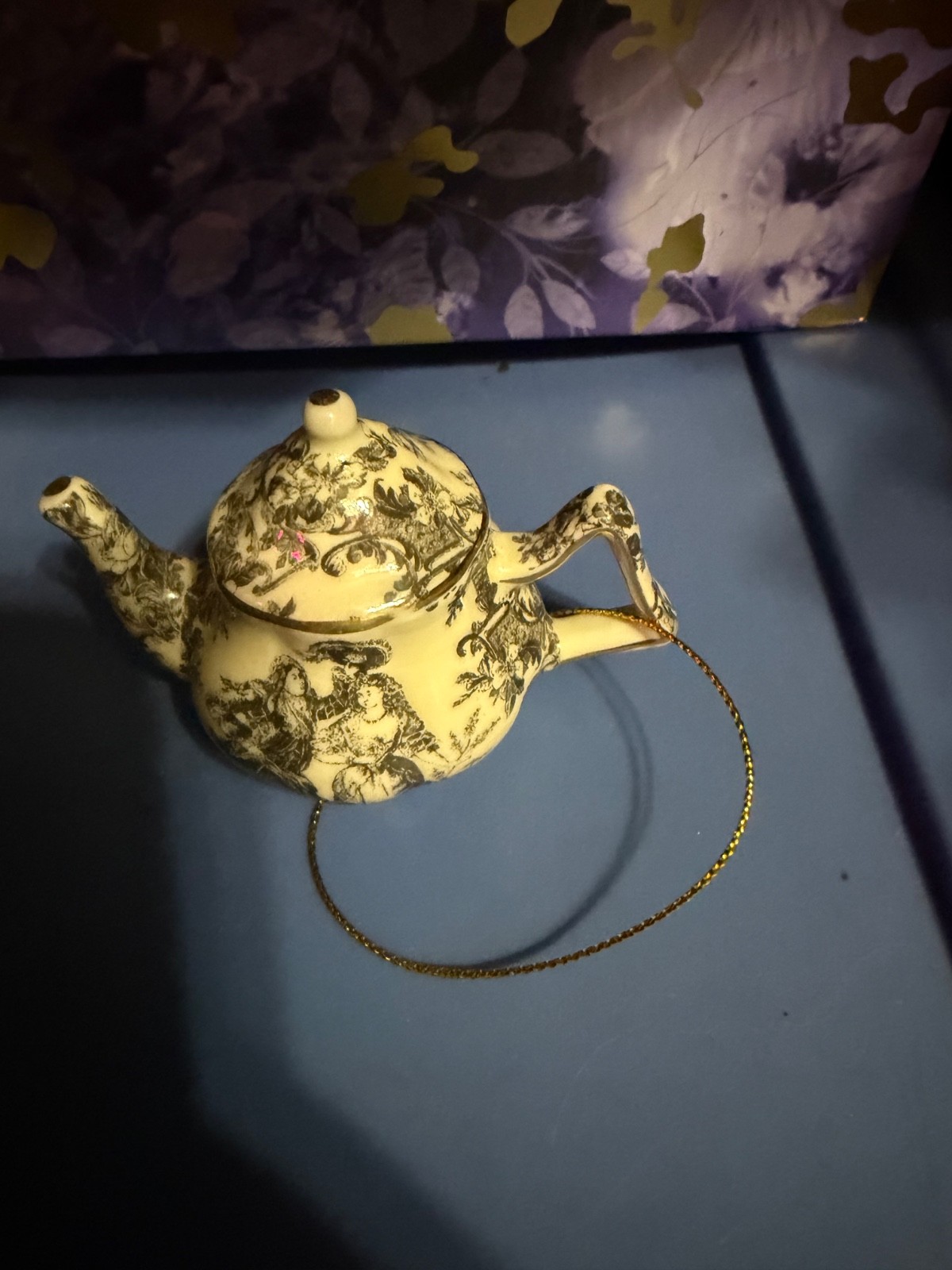Miniature porcelain teapot ornament with brown and white toile pattern
