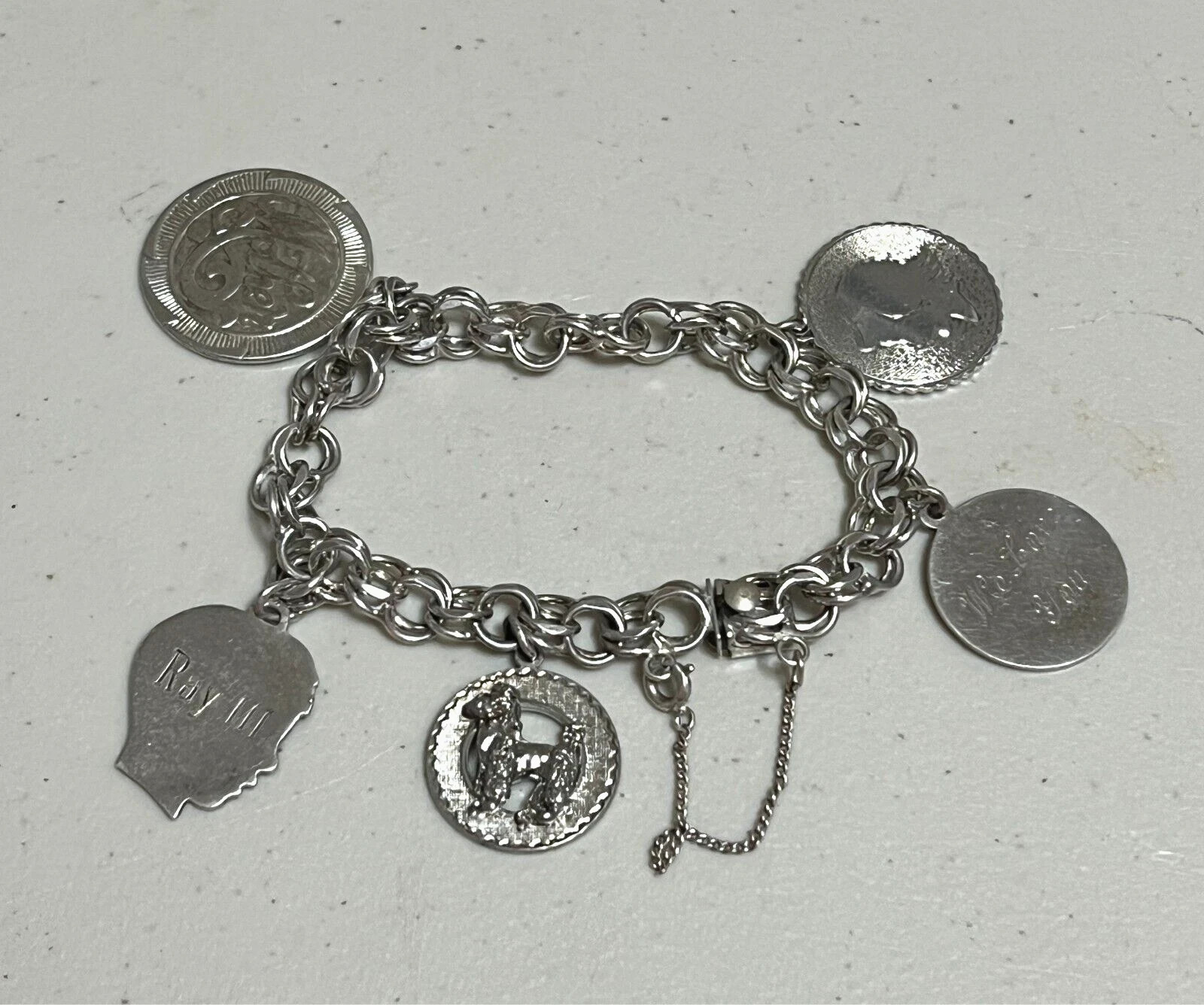 VINTAGE LOT OF 4 .925 STERLING SILVER CHARM BRACELETS W/ CHARMS 130 GRAMS