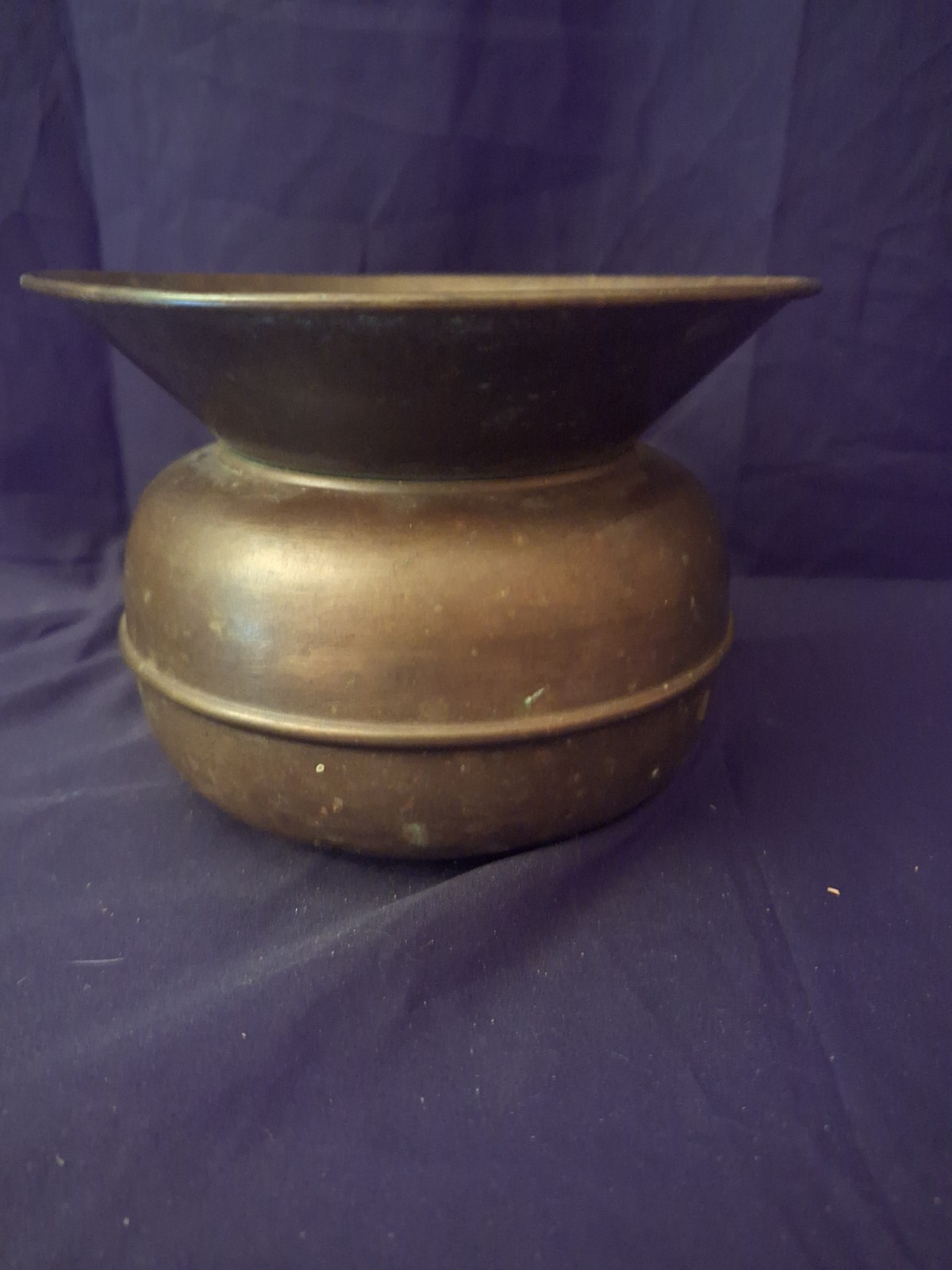 Vintage brass spittoon with a functional wide-rimmed design
