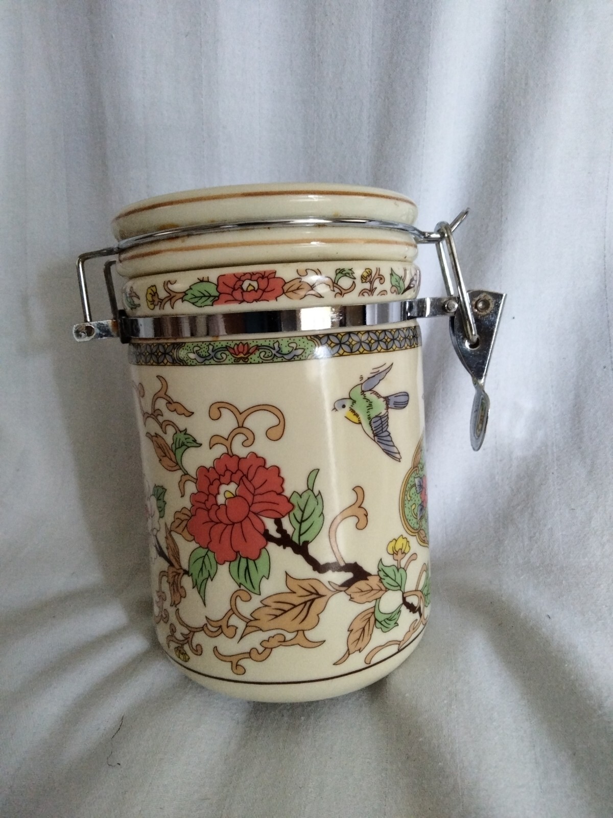 Beautiful Asian Tea Canisters..lovely orange and pink flowers and birds