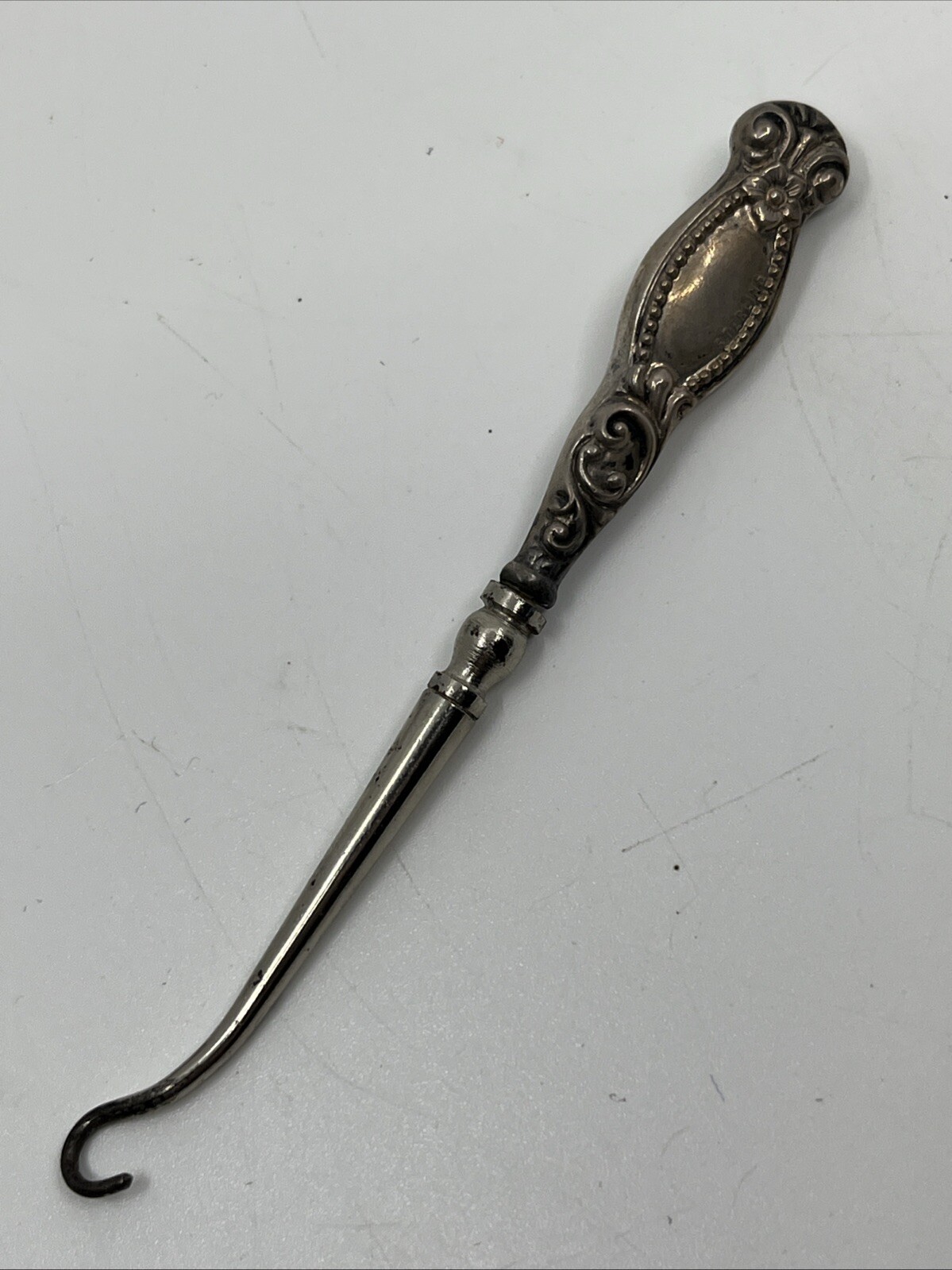 Antique Sterling Silver Button Hook 3 5/8” Repousse Flower Floral Scroll