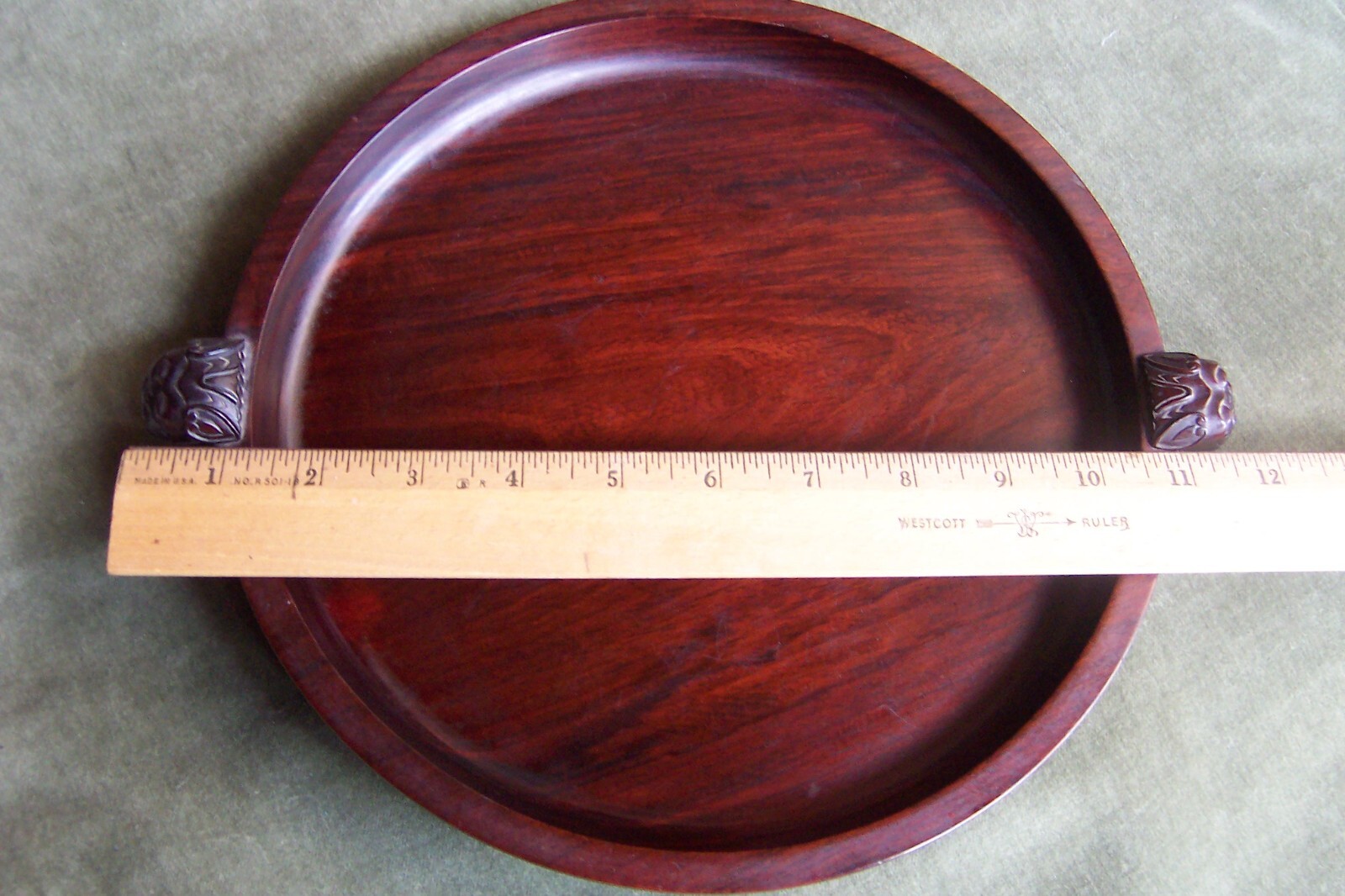 antique Chinese hardwood plate-11.5 inches x 1.5 inches reddish -very heavy-