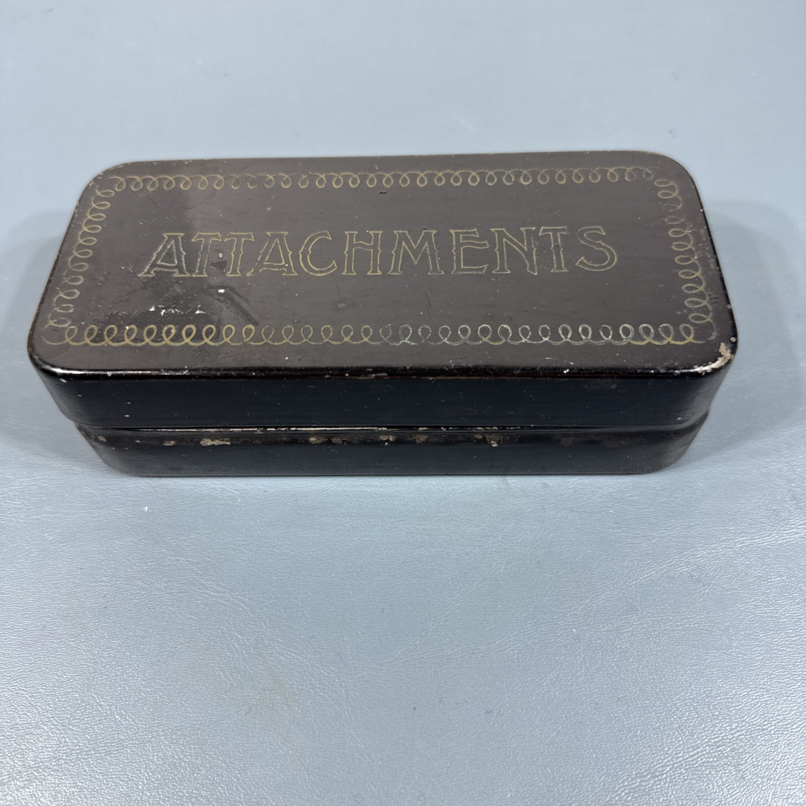 Vintage Sewing Machine Attachments in original metal Box