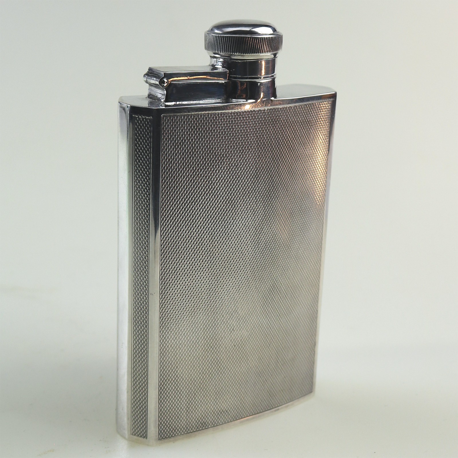 A good mid-century solid silver curved 8-panel sides Hip Flask 142g C.1955