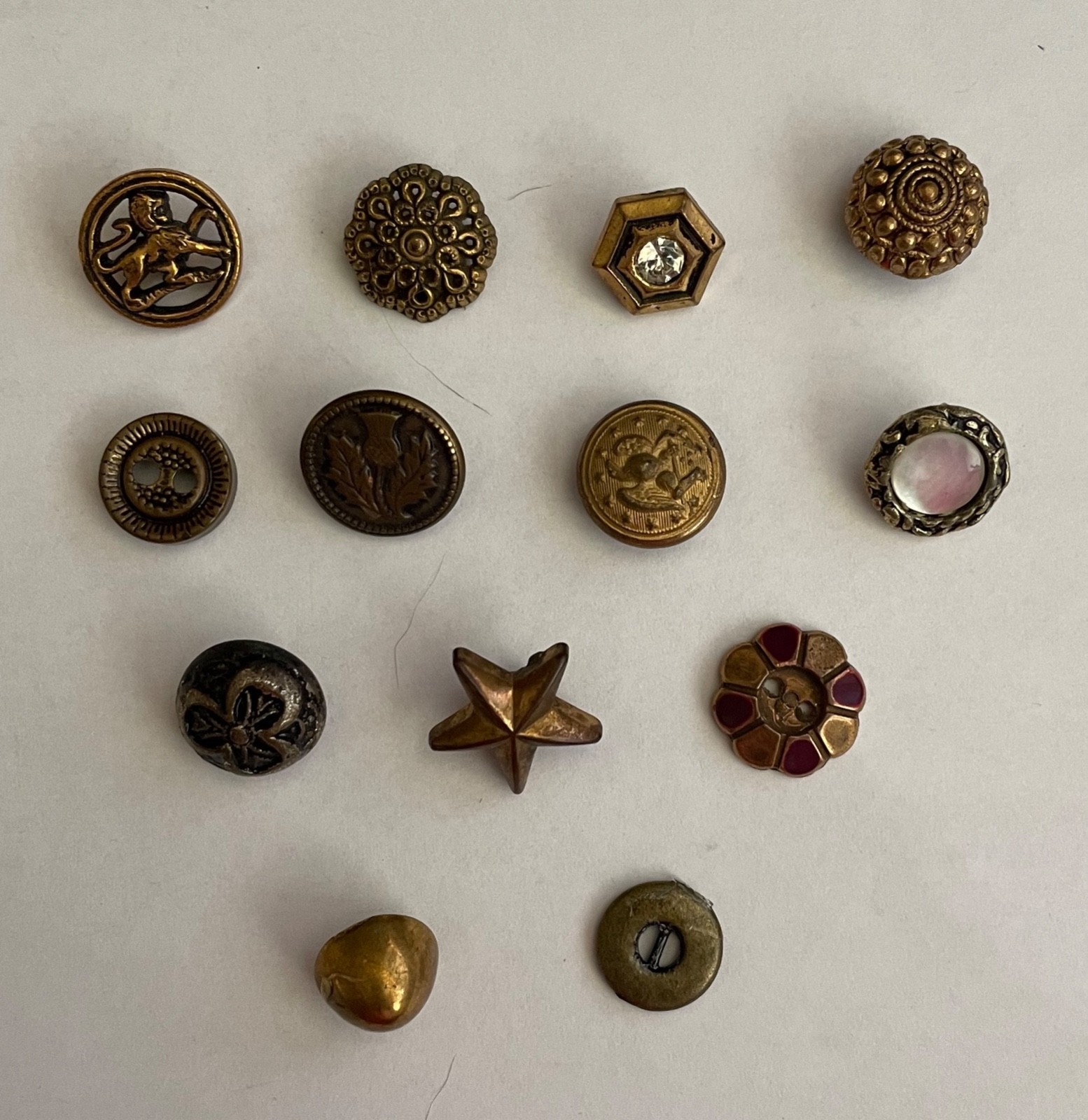 13 Antique/Vintage Metal/Plastic Buttons of Various Designs .5″