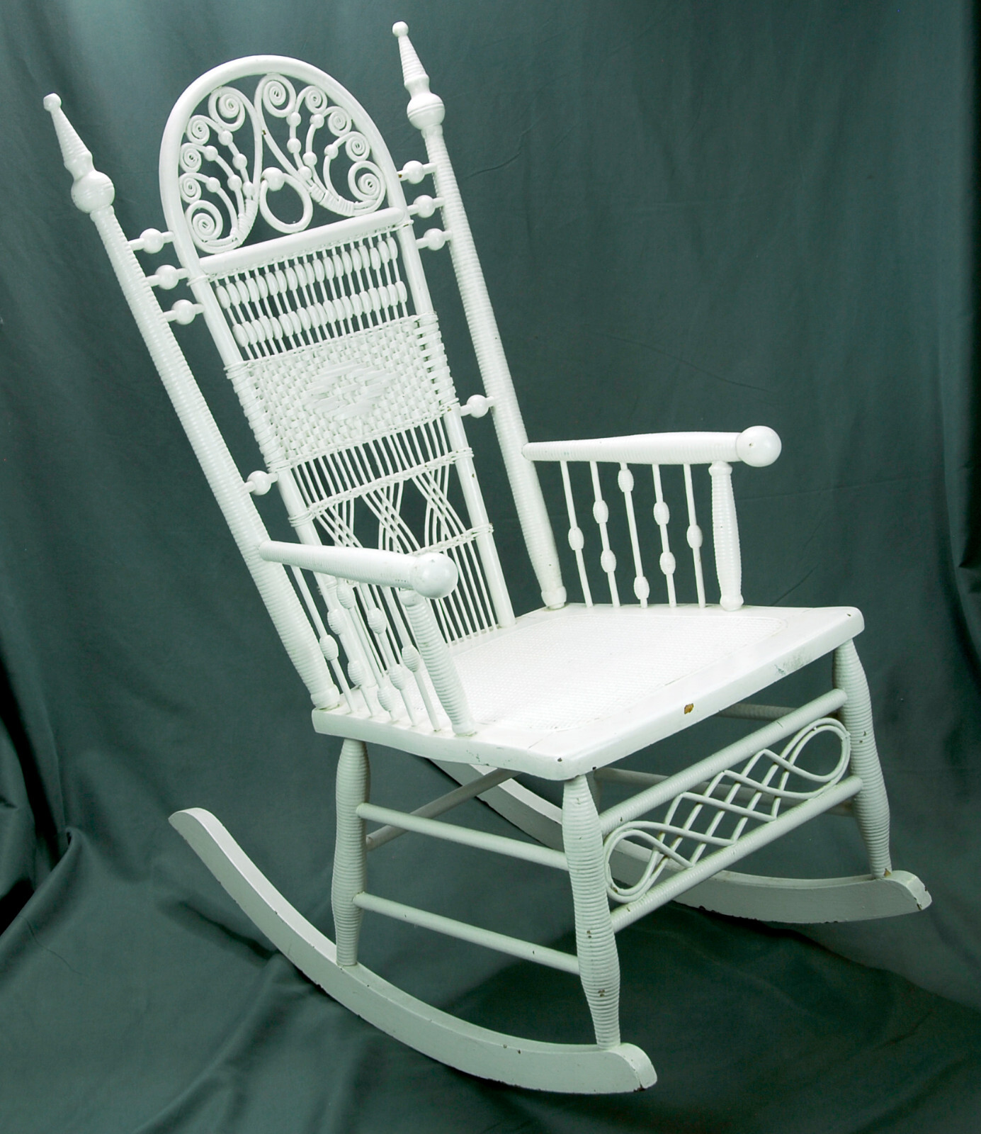 1800s Wakefield Rattan Company Eloborate Wicker Painted Rocking Arm Chair