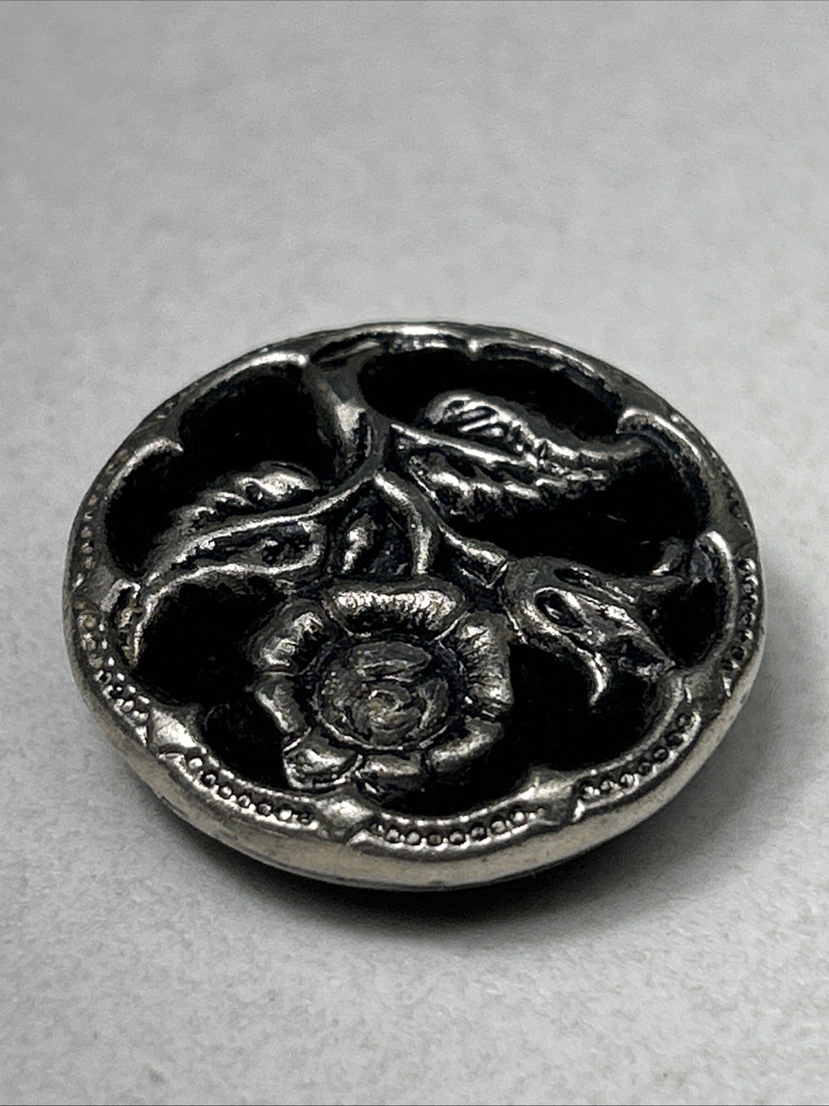Antique Metal Sewing Button Silver Tone Flower On Top Of Black Velvet