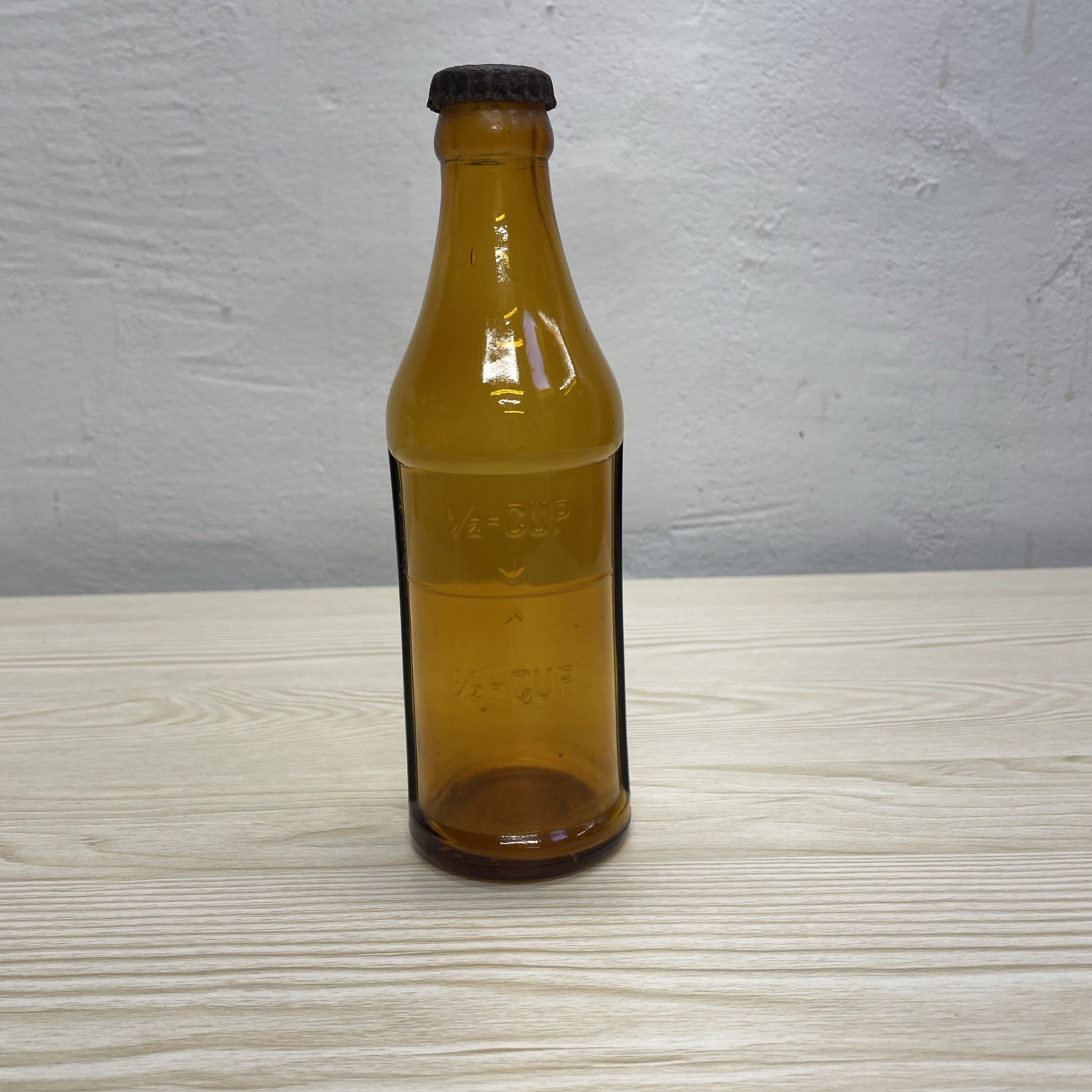 Vintage Embossed Amber Glass Measuring Bottle 1/2 Cup