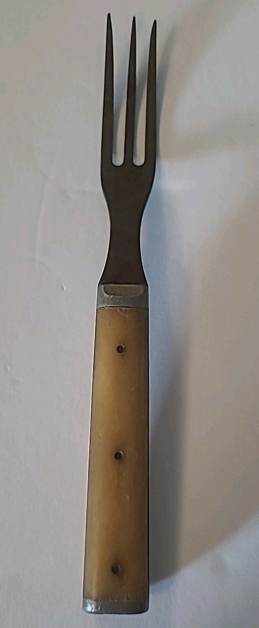Antique 3 prong fork bone handle top, wooden bottom. 7 inches