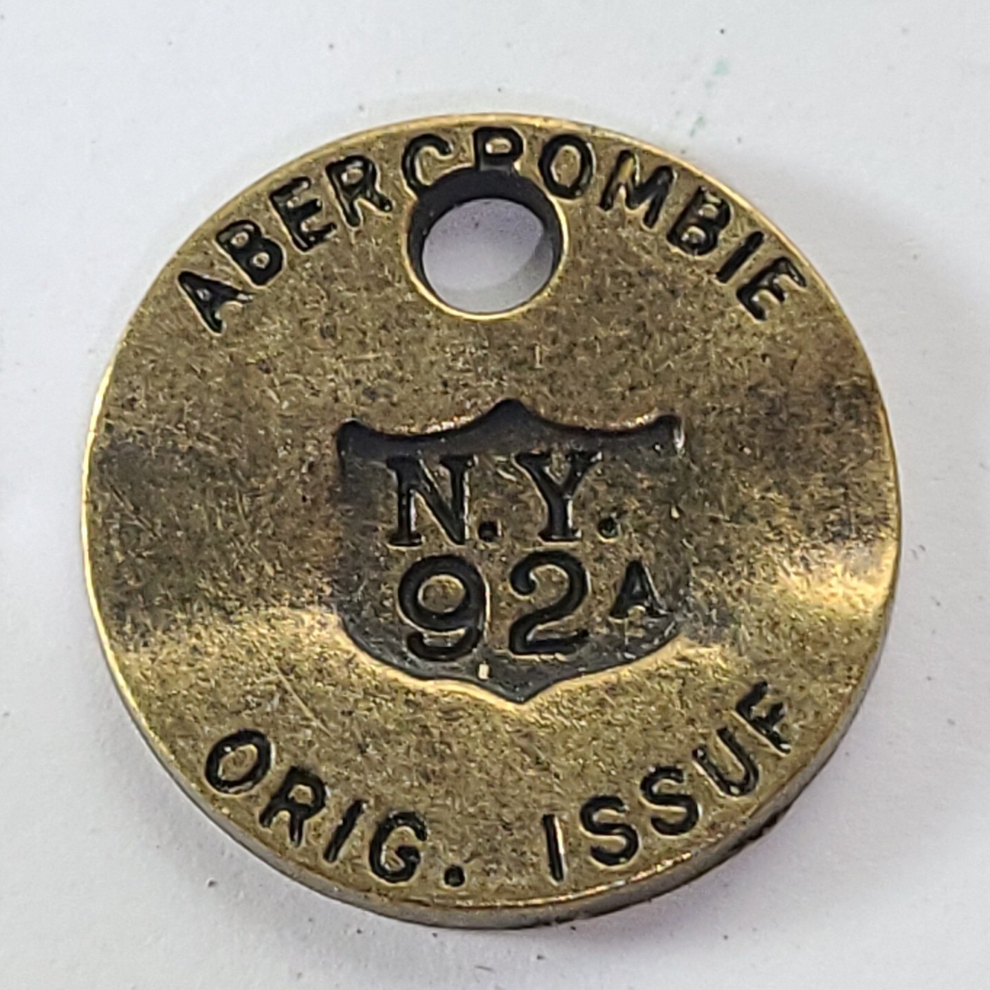 Abercrombie & Fitch 1892-1904 Vtg Brass Hang Ear Tag Jewelry Pendant Medallion