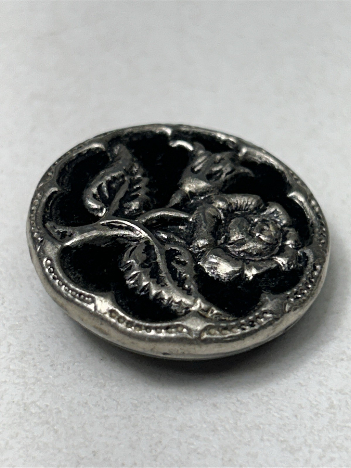 Antique Metal Sewing Button Silver Tone Flower On Top Of Black Velvet