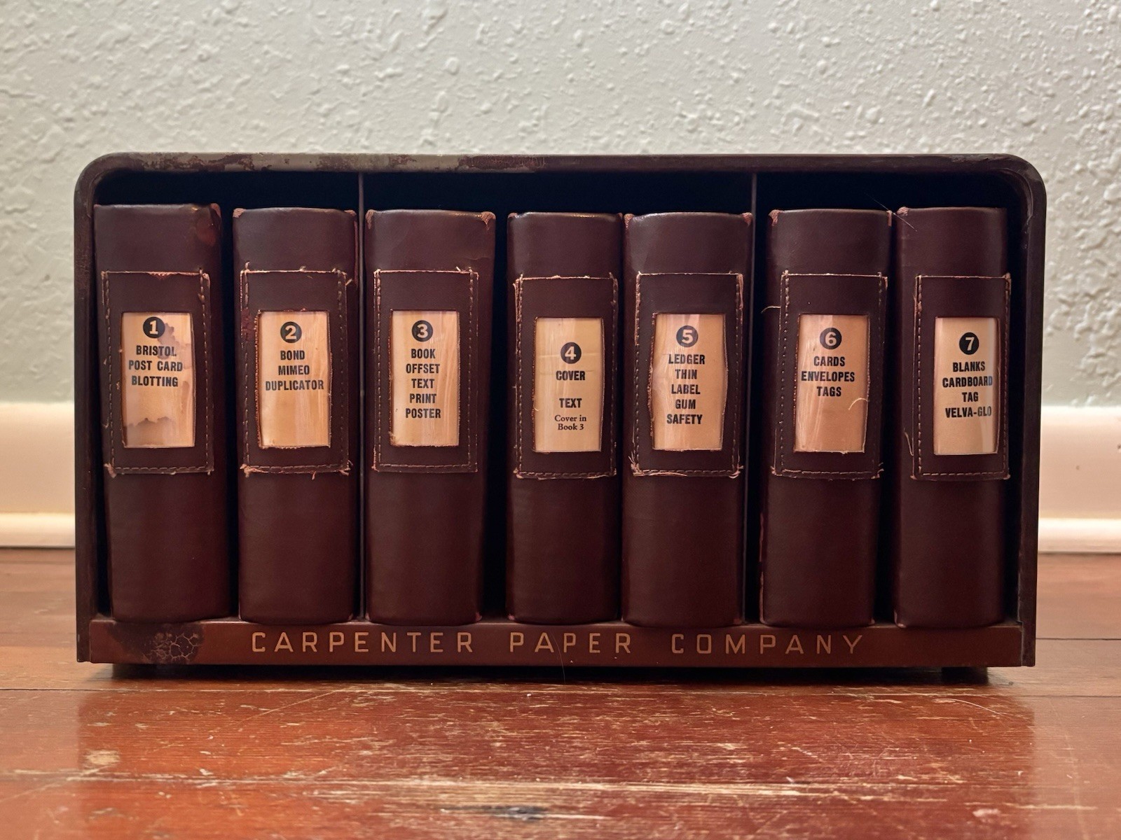 Carpenter Paper Company paper sample book binder in counter case Denver Colorado