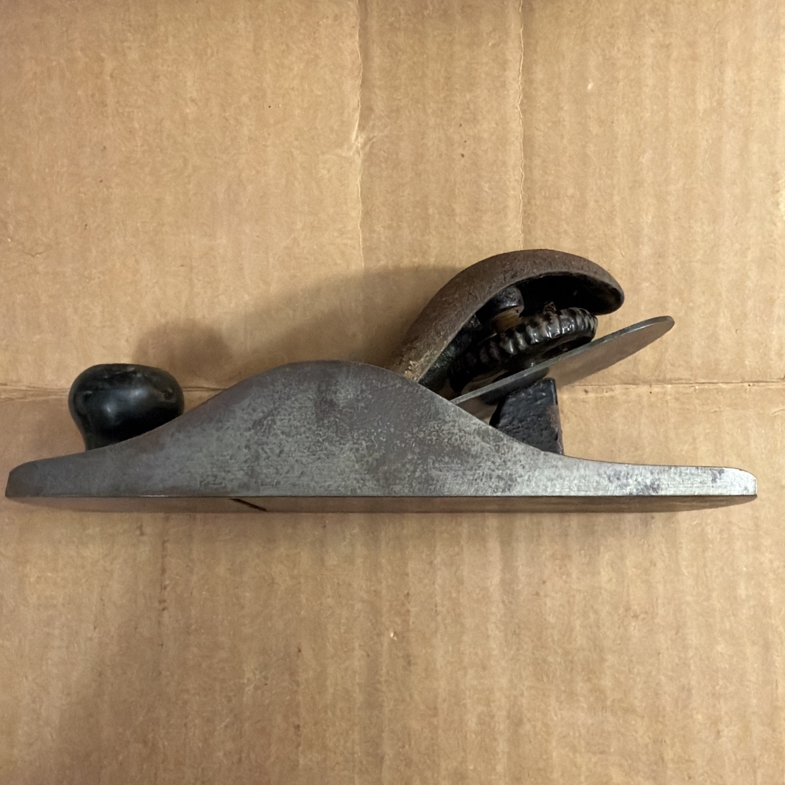 Stanley No. 110 block plane with “V” logo on the cutting iron. Rosewood knob.
