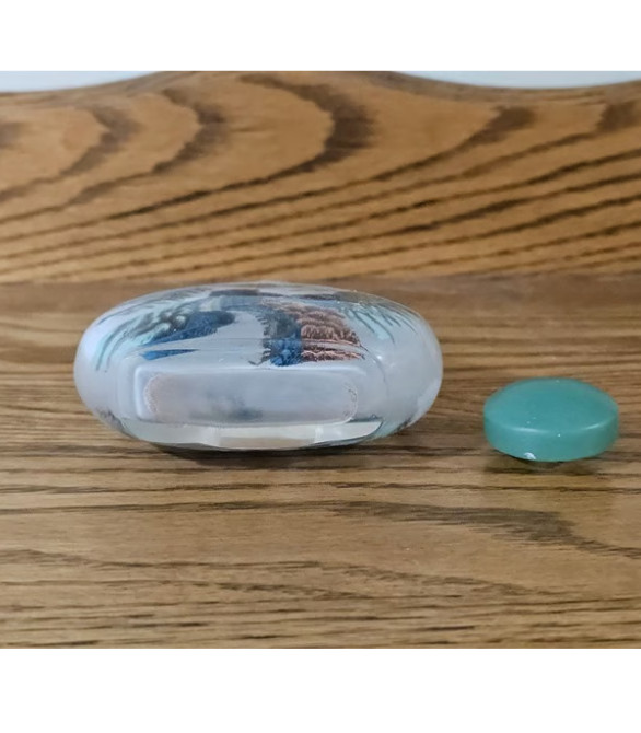 Chinese reverse painted snuff bottle with scenes from the Great Wall of China