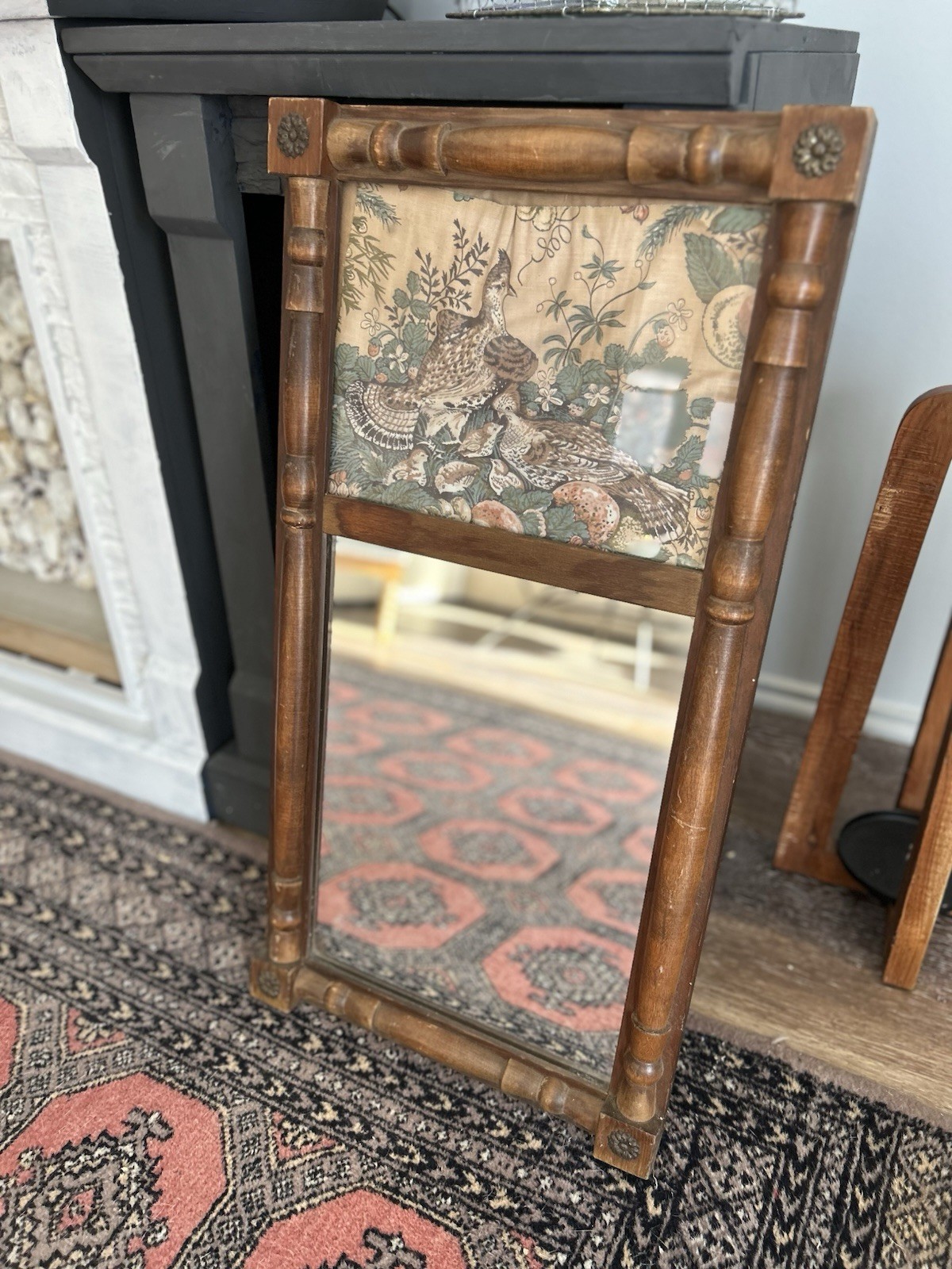 Wooden trumeau mirror w/ tapestry panel featuring pheasants in a garden setting