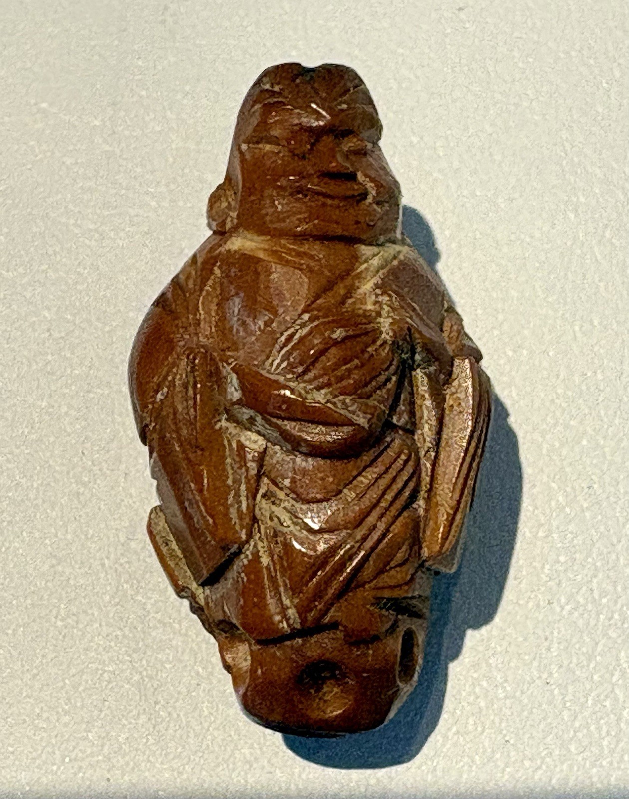Antique Chinese Hand Carved Olive Pit Scholar Figure Bead Toggle c.1900–1930