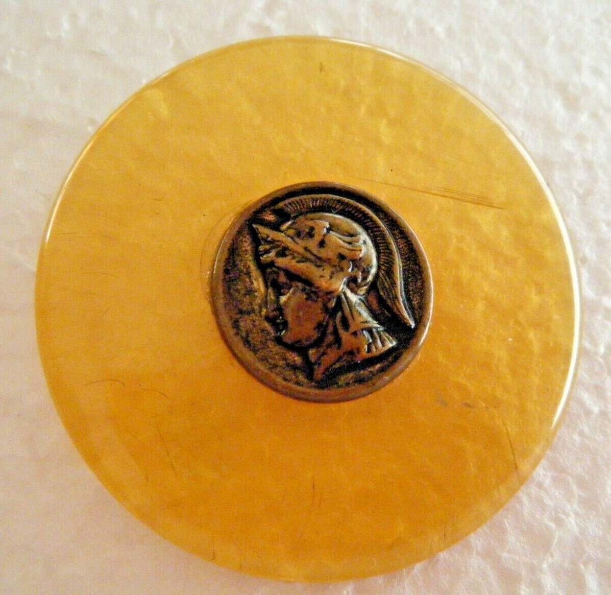 Vtg picture button Apple Juice Bakelite amber color w brass button warrior 2″