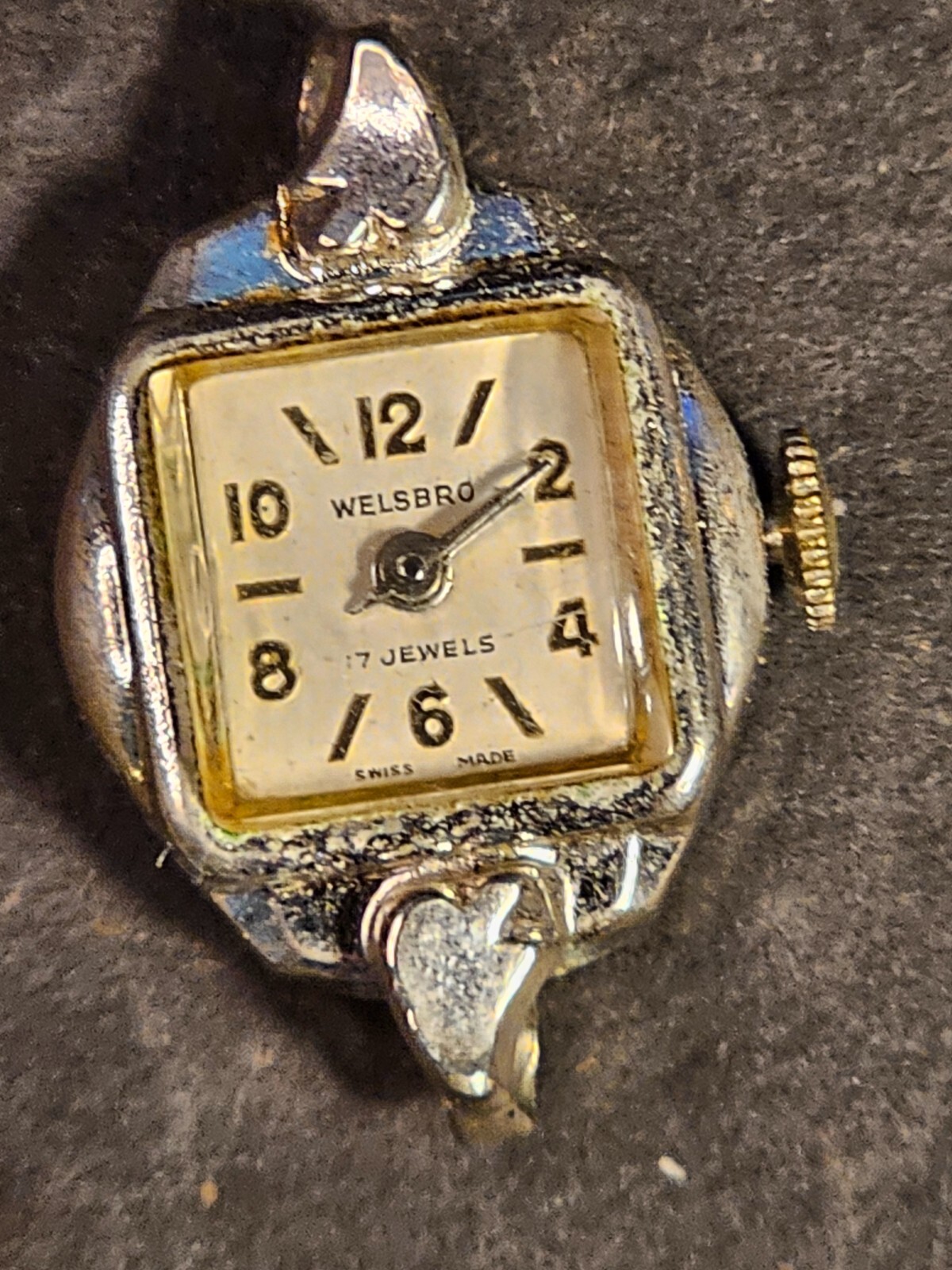 Box lot of assorted costume jewelry parts and a watch .
