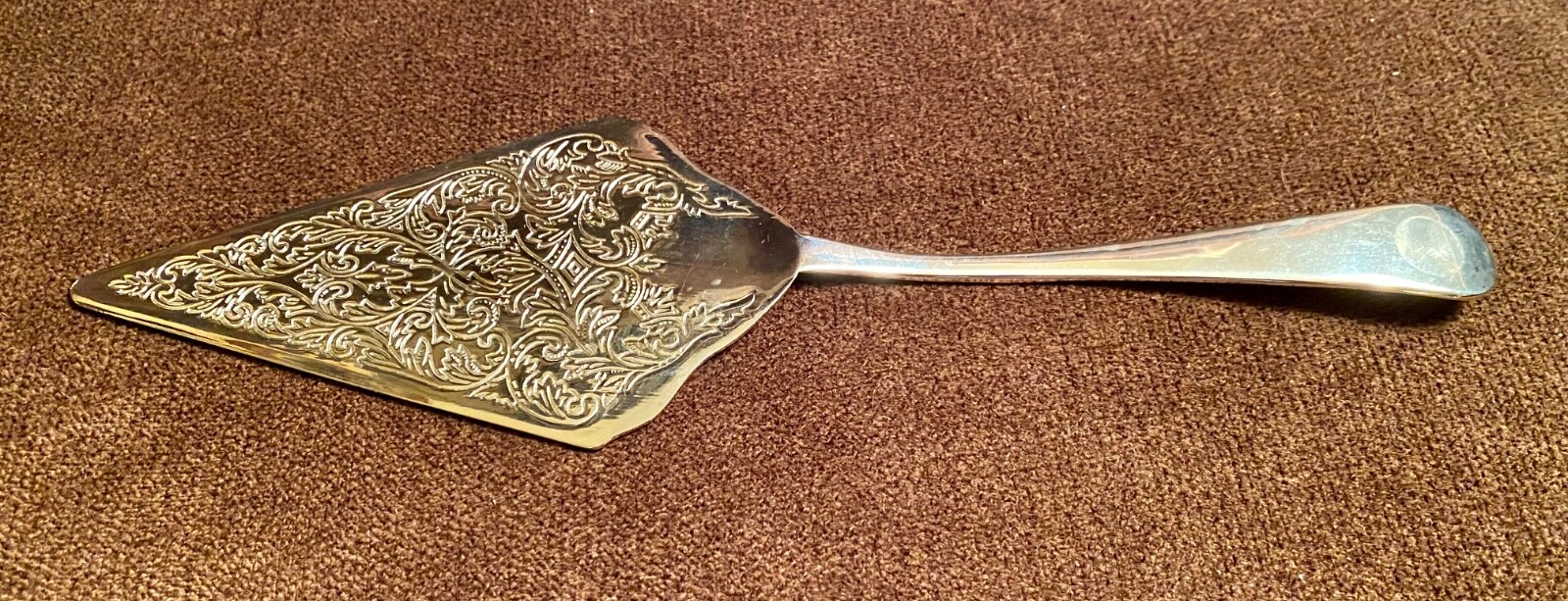 Stokes? ISC? engraved silverplate cake server, serrated edge