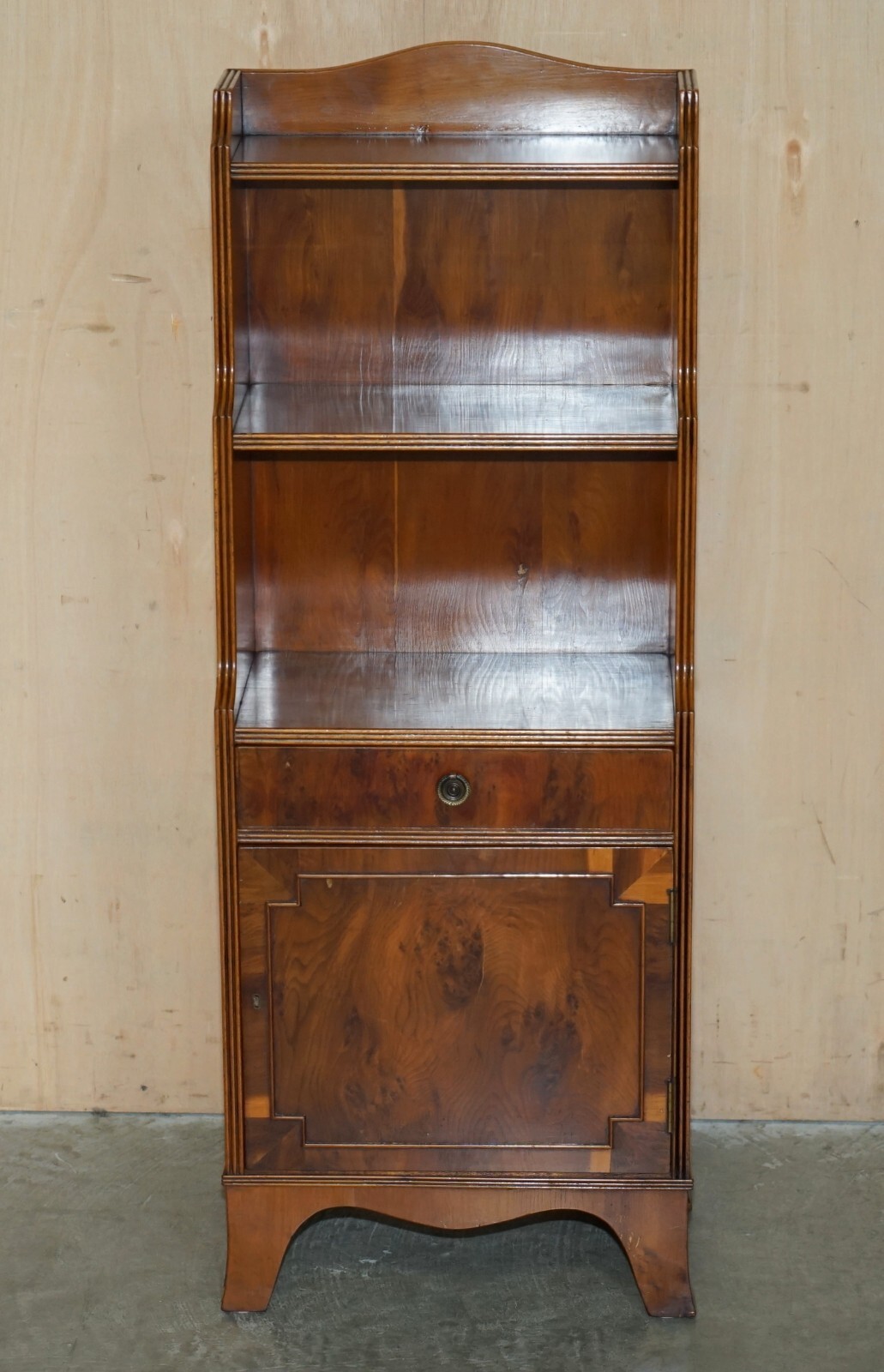 PAIR OF VINTAGE ENGLISH FLAMED MAHOGANY WATERFALL BOOKCASES WITH CUPBOARD BASES