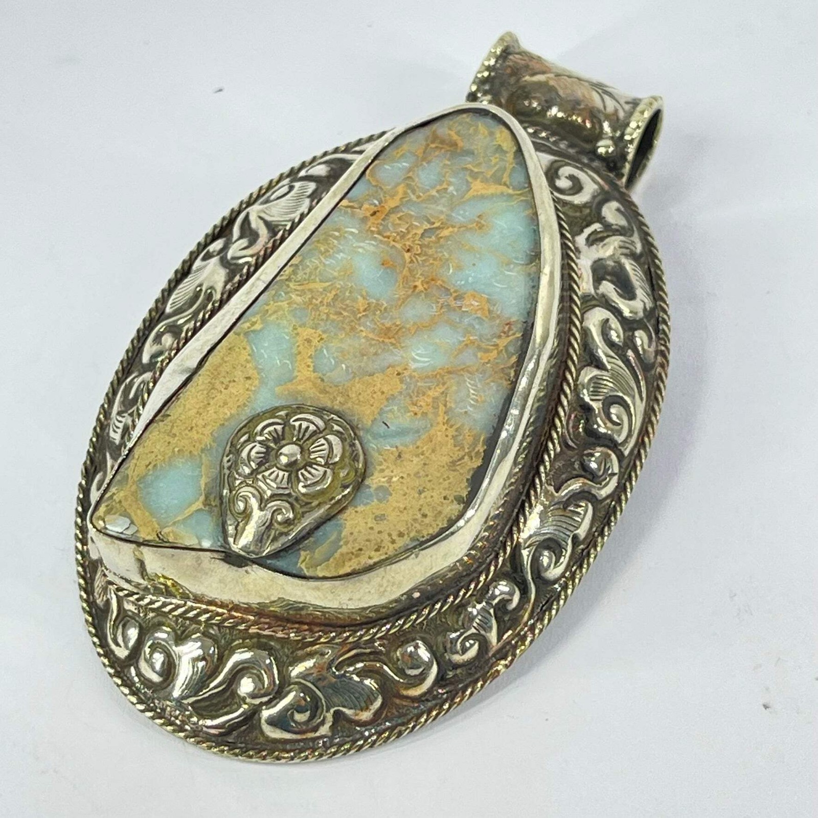 Tibetan Stone Floral Repoussé Pendant