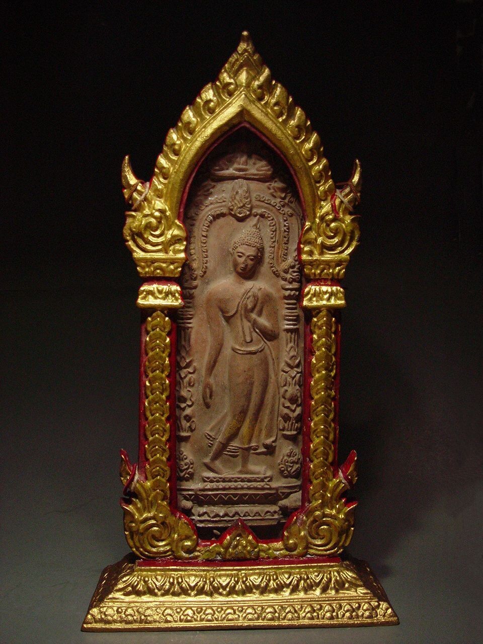 CLAY BUDDHIST VOTIVE PLAQUE ‘PHRA LEELA’ SHRINE, SUKHOTHAI PROVINCE. 19th C.
