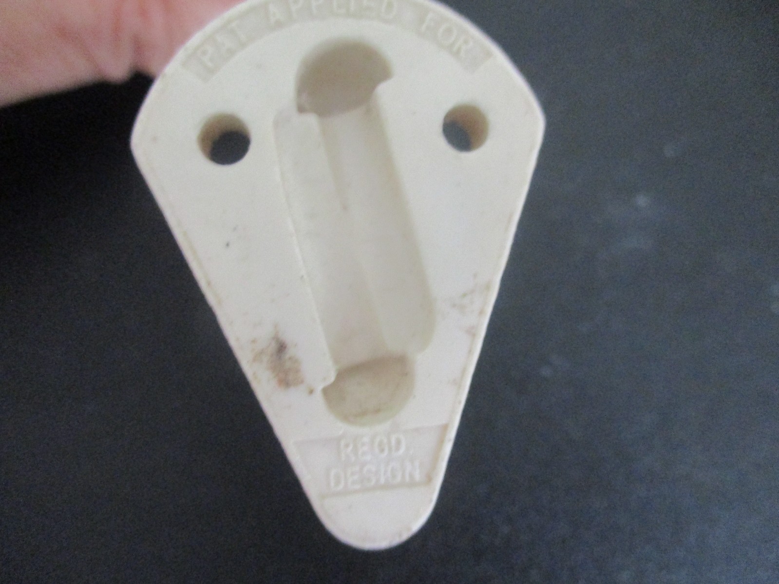 Three 1950s wall hooks
