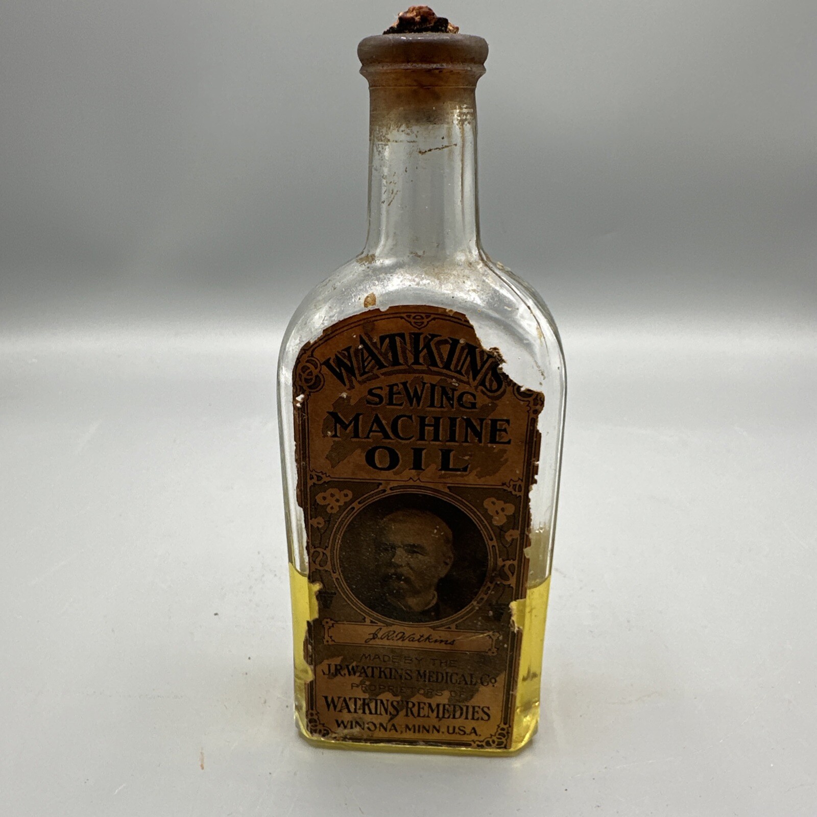 Antique WATKINS SEWING MACHINE OIL Bottle Paper Label WINONA MINN USA 1/2 Full