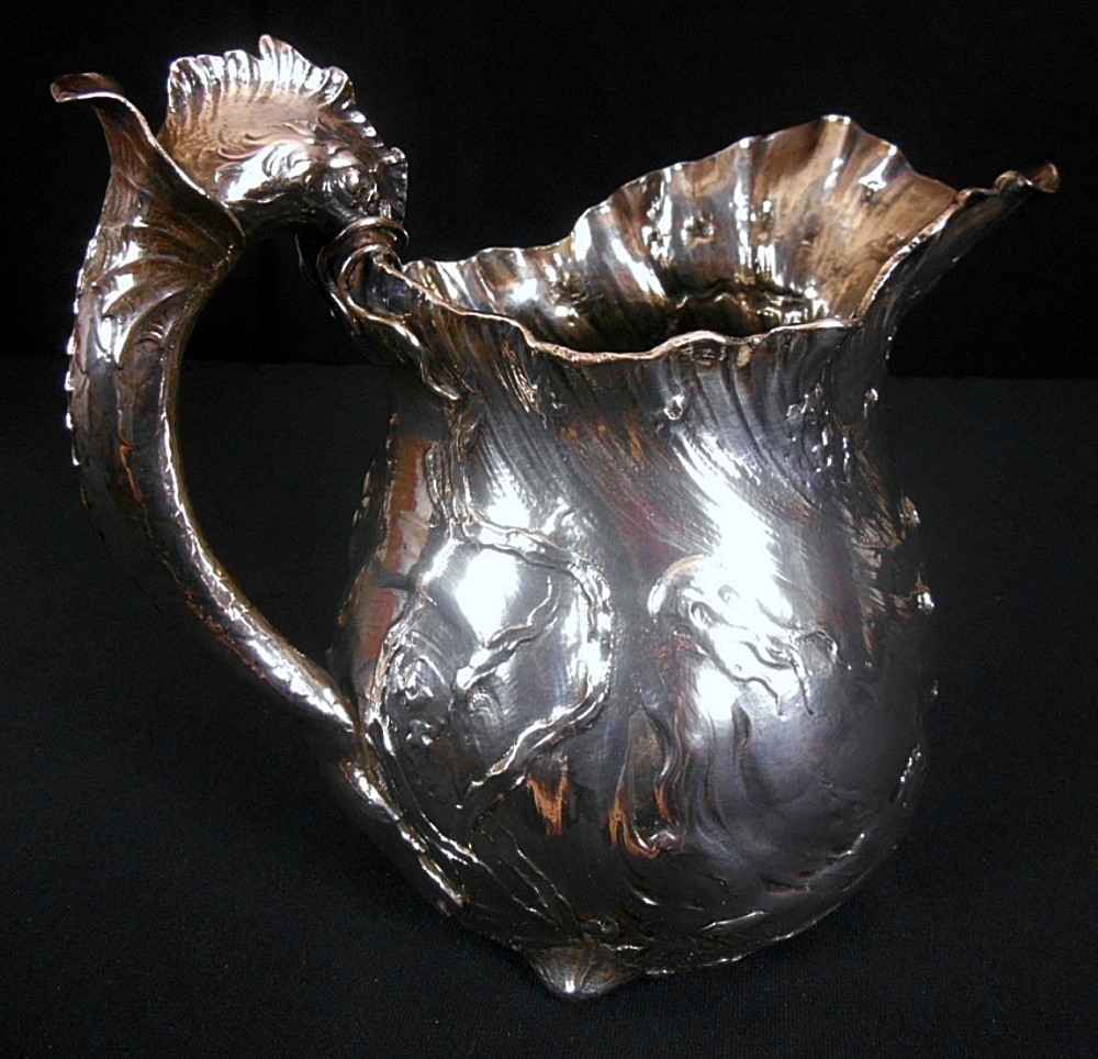A magnificent solid silver marine themed figural solid silver water pitcher, Ma