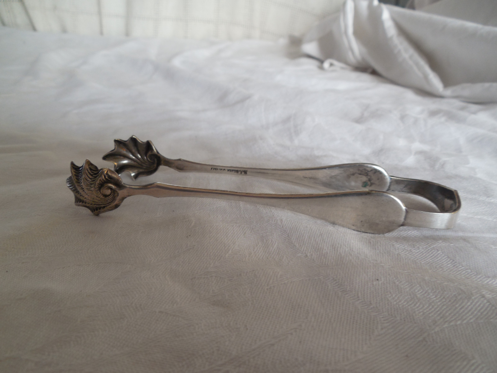 N.F. Niagare falls, Oneida silver sugar tongs 5″