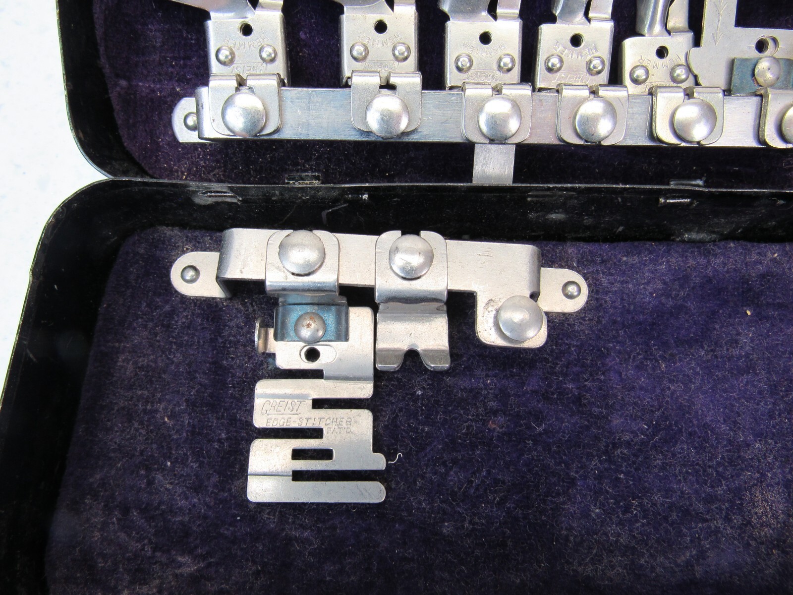 Antique Sewing Machine Attachments in original metal Box