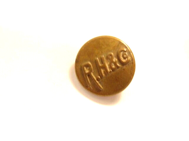 older brass colored “R.H. & Co.” button with 1913 and 1918 patent date on back