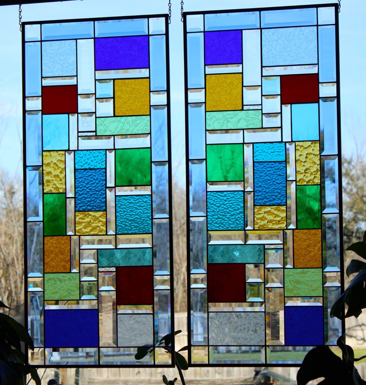 Stained Glass window pair, hanging panels each panel37.5×16.5 ” colored glass
