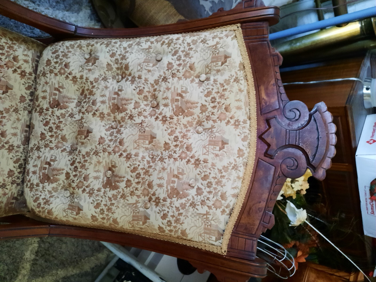 Antique gliding chair in great shape. Beautiful Upholstery and wood carving.