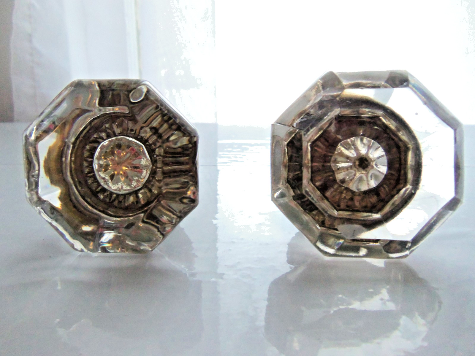 2 Antique Glass 8 Point Sunburst Pattern Octagon Knobs- One is Slightly Smaller