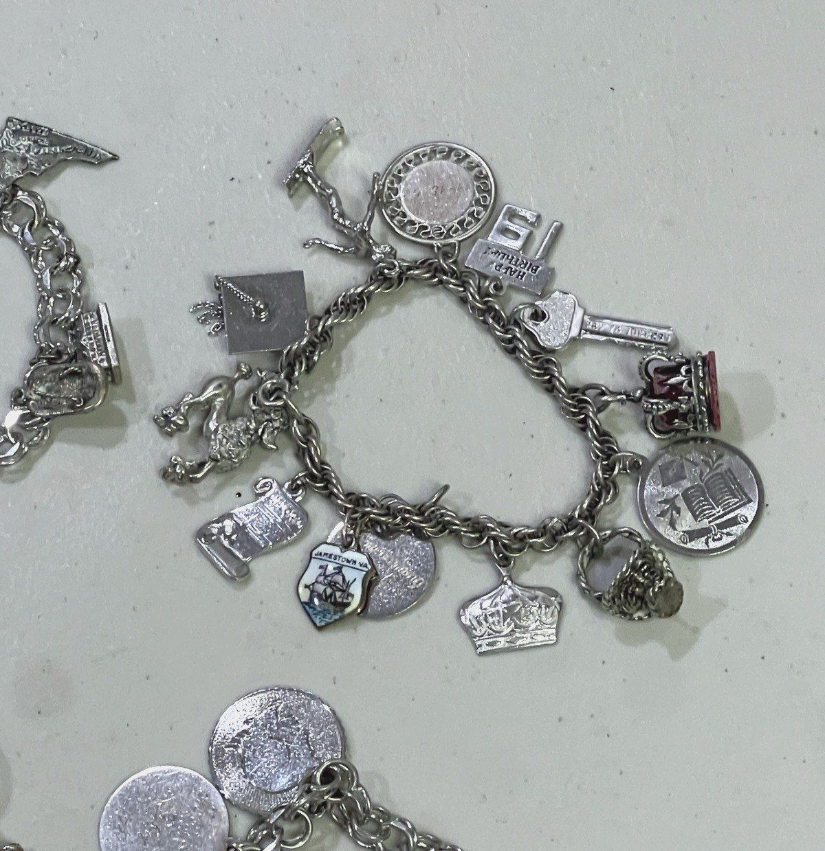 VINTAGE LOT OF 4 .925 STERLING SILVER CHARM BRACELETS W/ CHARMS 130 GRAMS