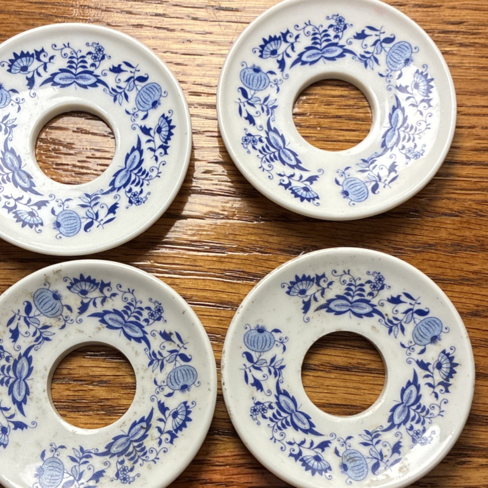 Set of Four Blue and White Ceramic Floral Escutcheons